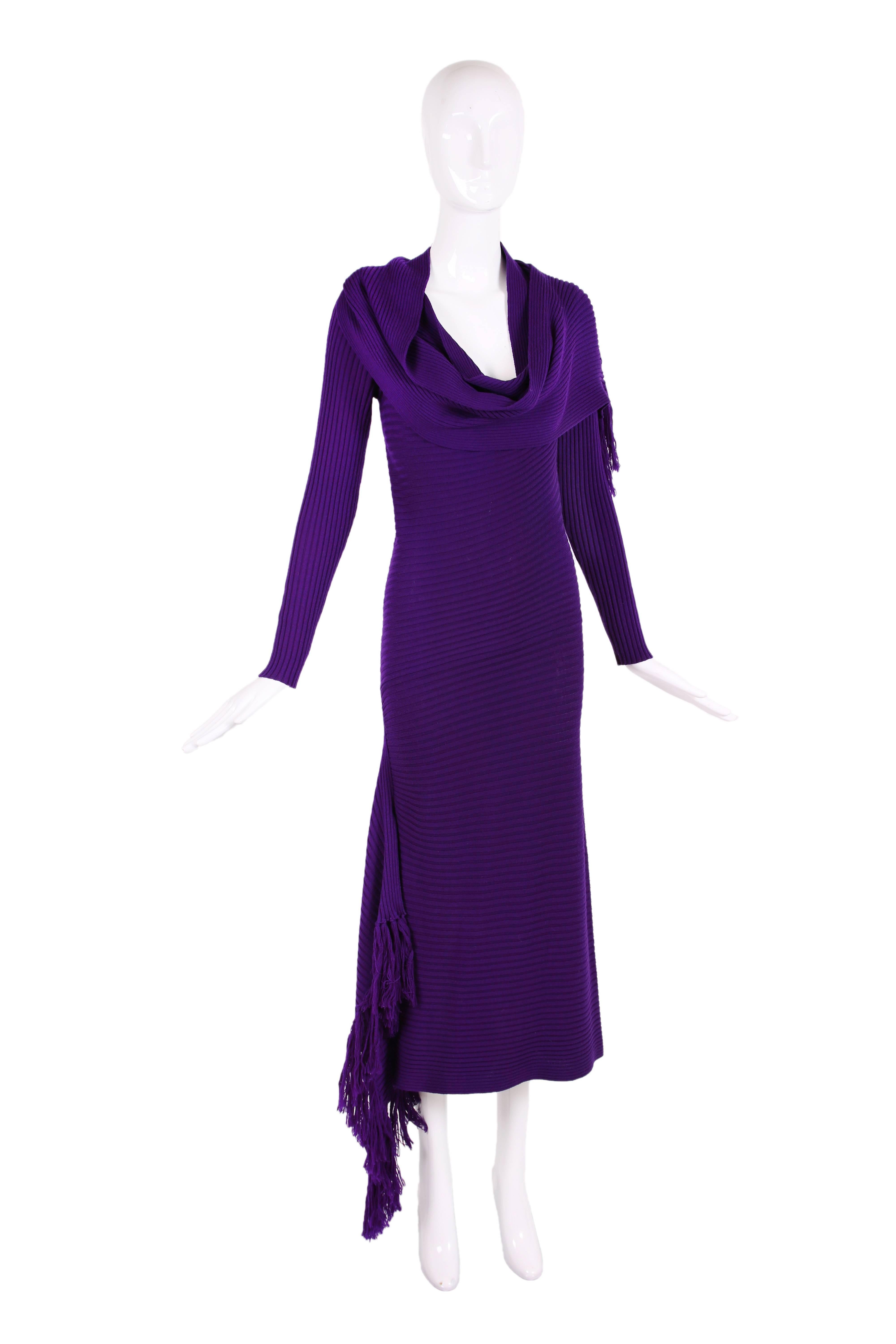 Jean Paul Gaultier deep purple ribbed knit bodycon dress w/fringed side slit, asymmetric hem and attached scarf w/fringe that can wrap multiple ways at the neck. In excellent condition. Size SMALL - please consult