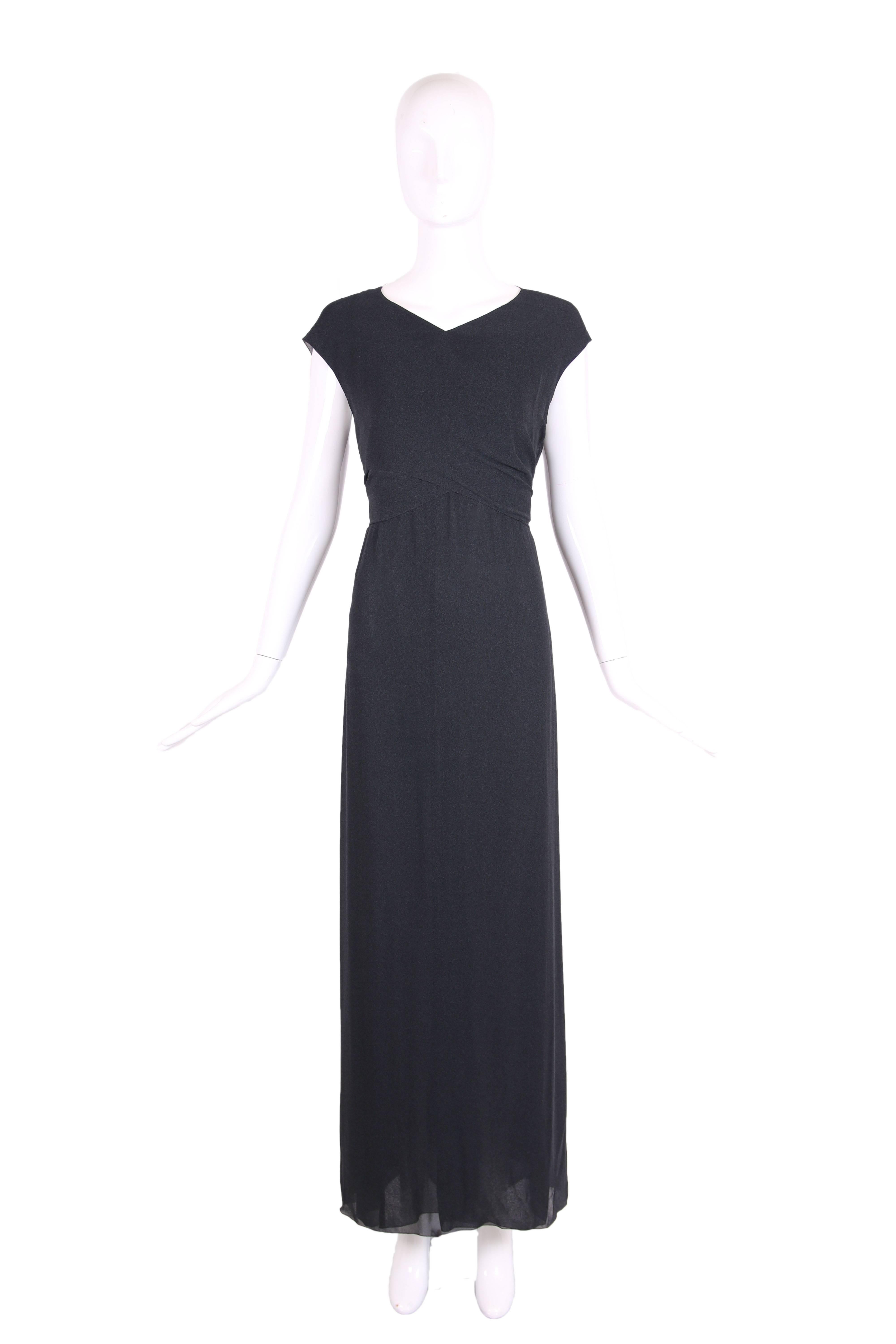 1998 Chanel slate gray crepe 2-pc comprised of a halter neck gown and overlay which criss-crosses at the front and can be worn tied at the back or front. In excellent condition. Size tag 40 - measurements are for halter neck gown underlay. 