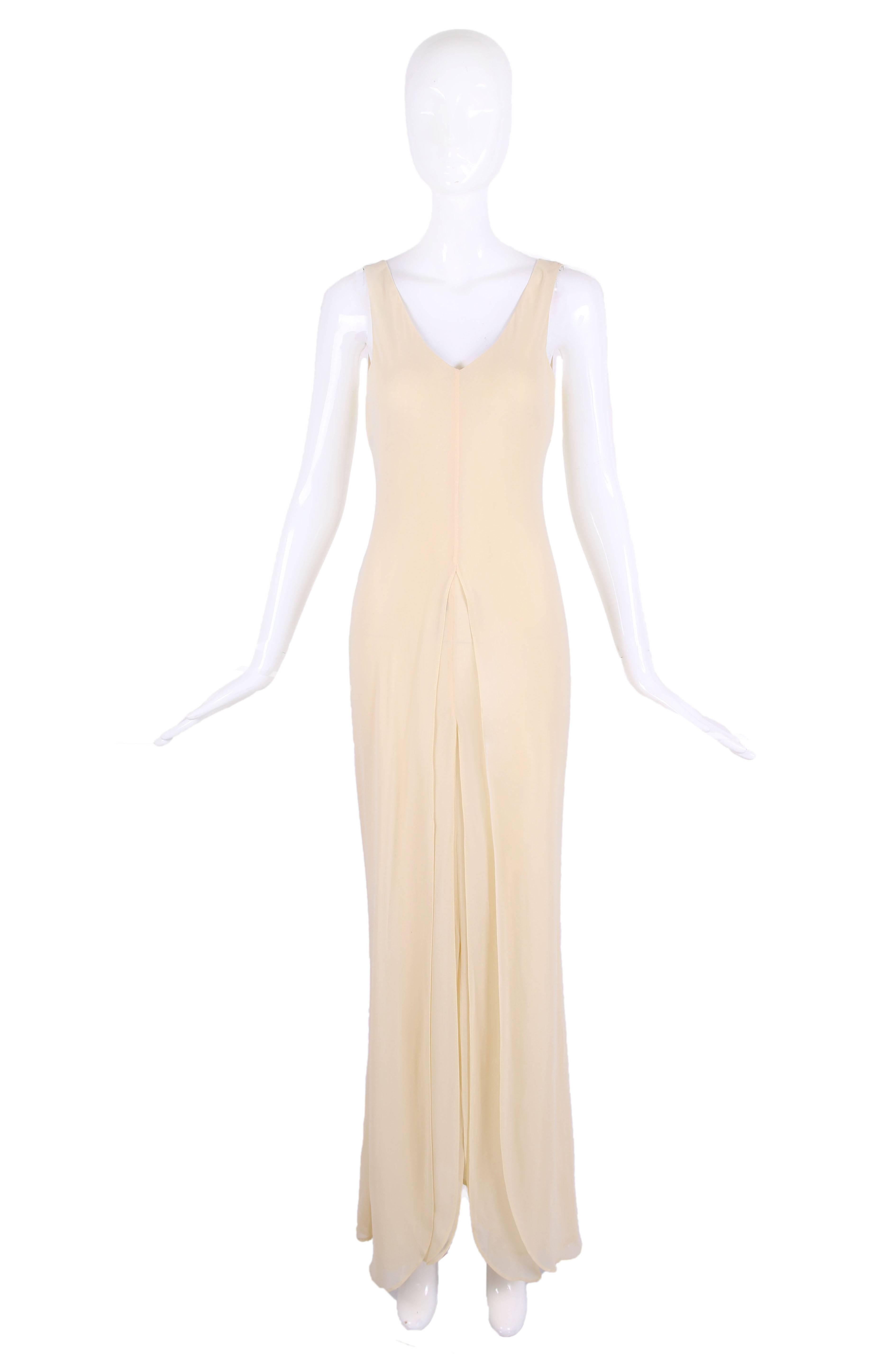 Alberta Ferretti cream-colored sleeveless triple-layered bias cut rayon gown. Size tag US 8 but fits more like a 6. In very good to excellent condition with a few tiny tiny holes  that are almost impossible to see located at the back hem. Please