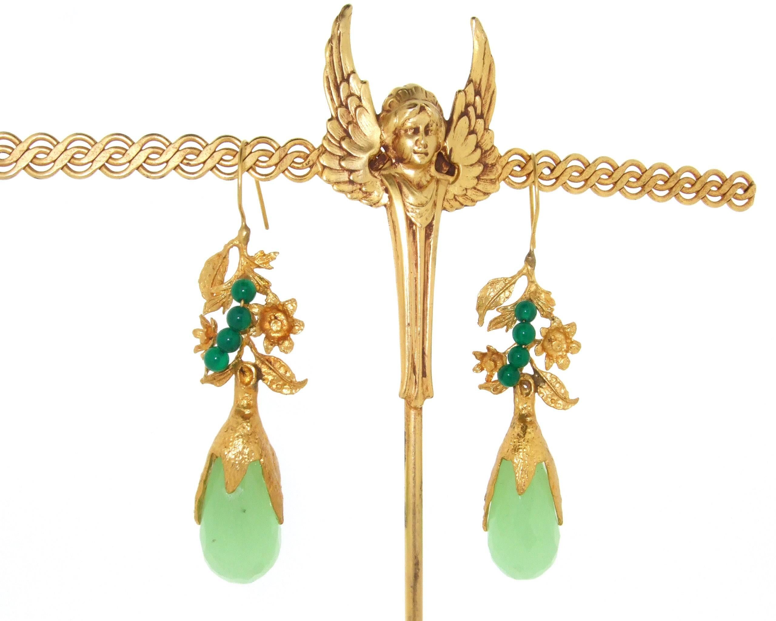 A stunning  pair of mint green chalcedony earrings in an Art Nouveau/ byzantine style, gold plated. 

They measure 7.6cm, the large green stone is 1.3cm wide.
