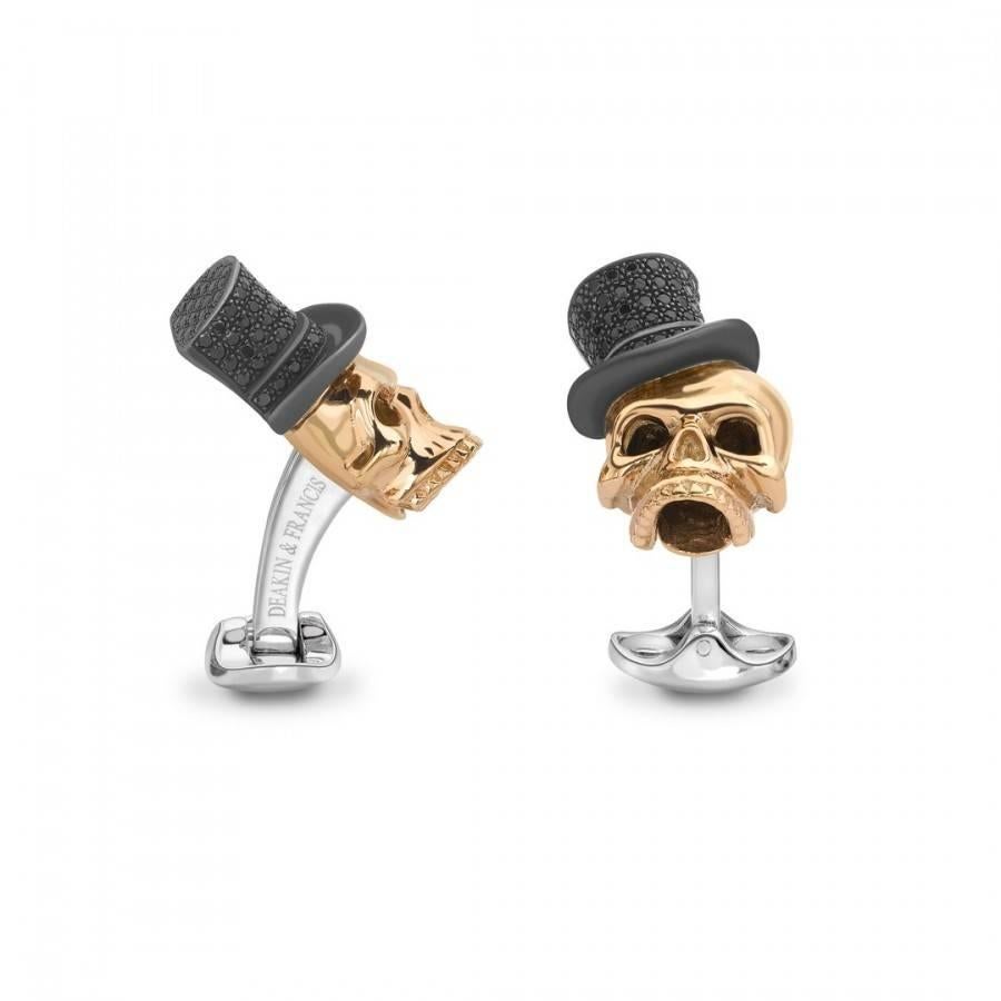 These sterling silver statement skull cufflinks have been rose gold plated and feature a top hat set with stunning semi-precious black spine stones! Frightfully good!

The skull with top hat measures 2.5cm high by 1.4cm wide at the head by 1cm.

