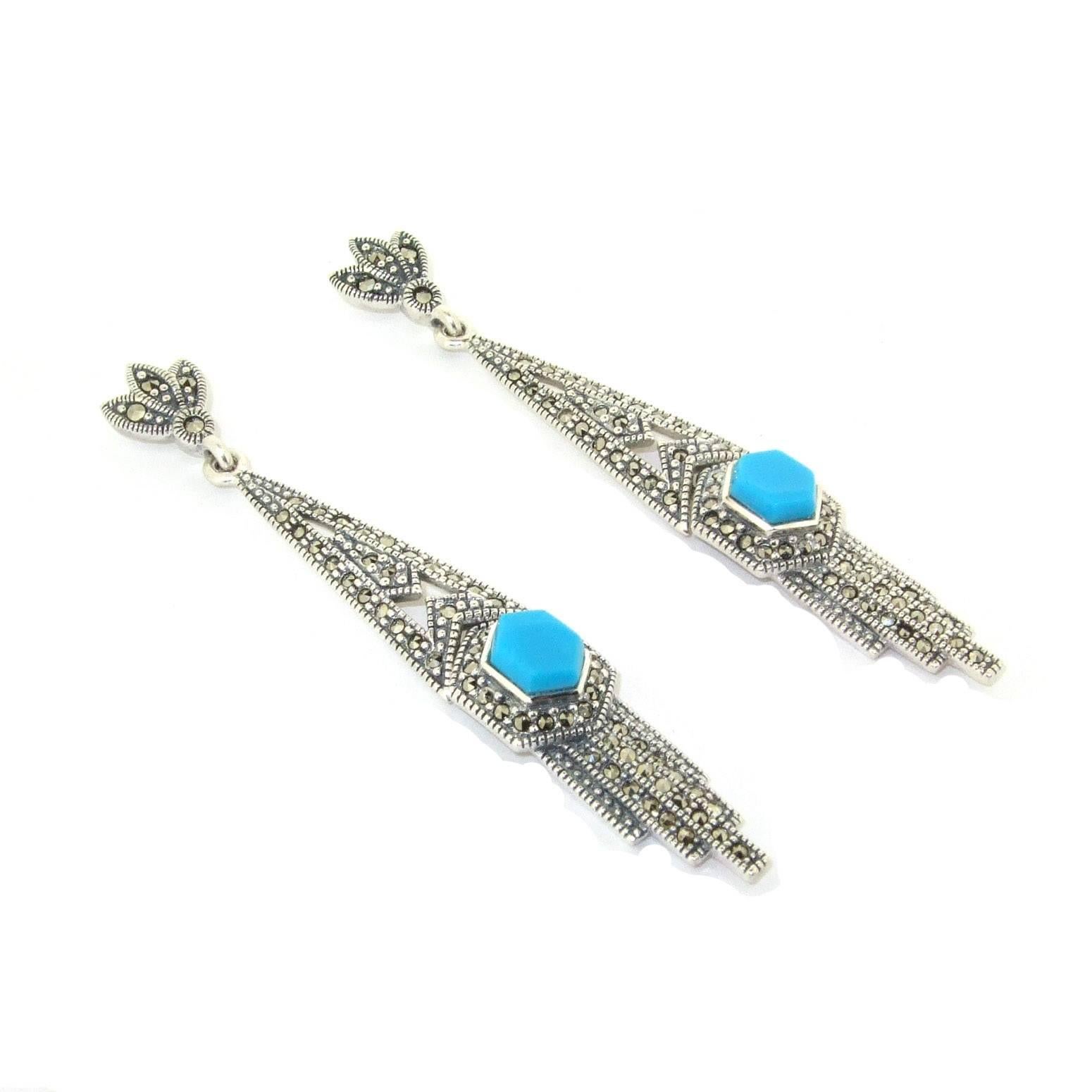 A new pair of sterling silver earrings in Art Deco style set with blue turquoise stones and decorated with sparkling marcasites. Hallmarked 925. The lower section swings freely from the top section. 

They measure: Length/drop 6.8cm (2 3/4 inches),