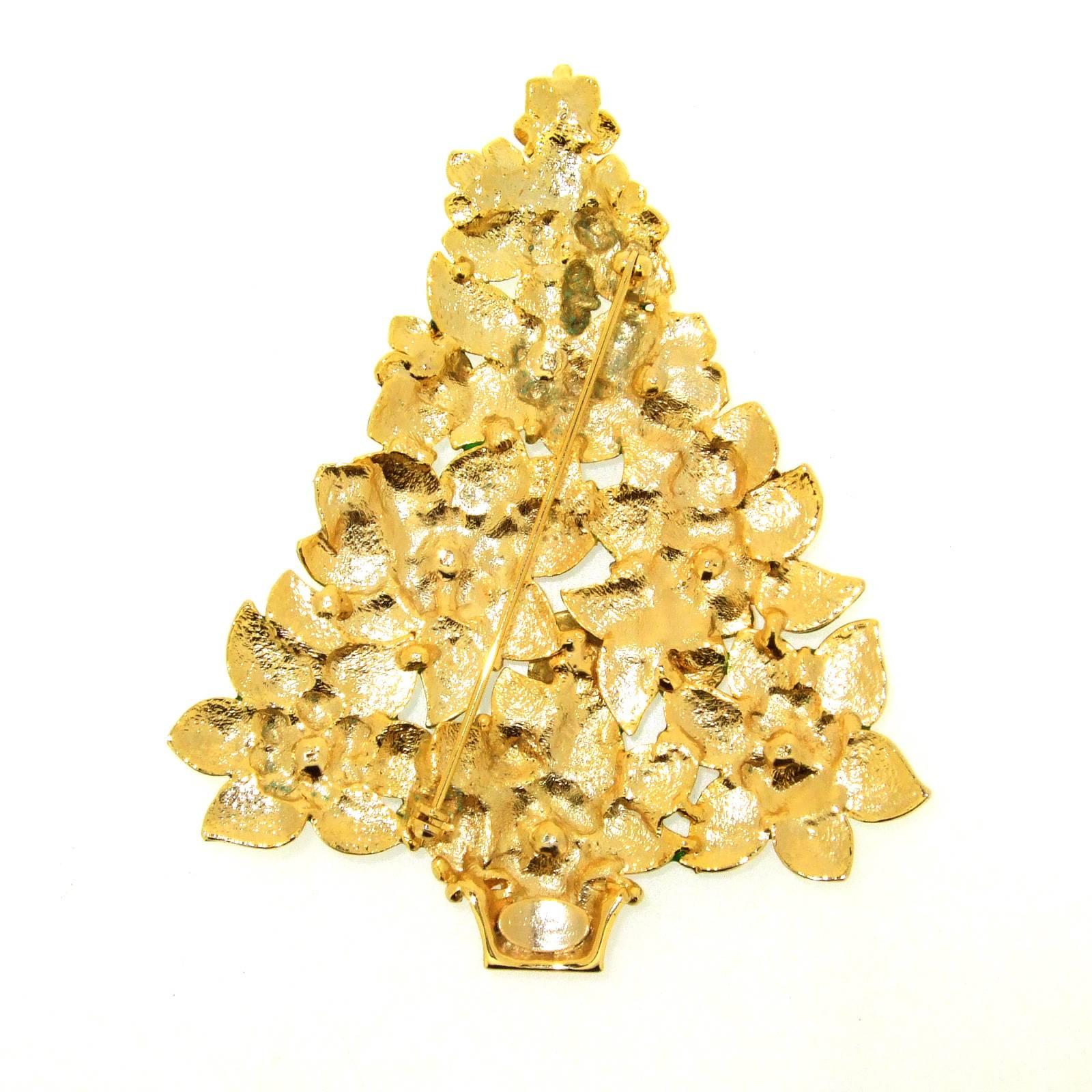 A stunning oversized Christmas tree brooch by Cristobal London. 