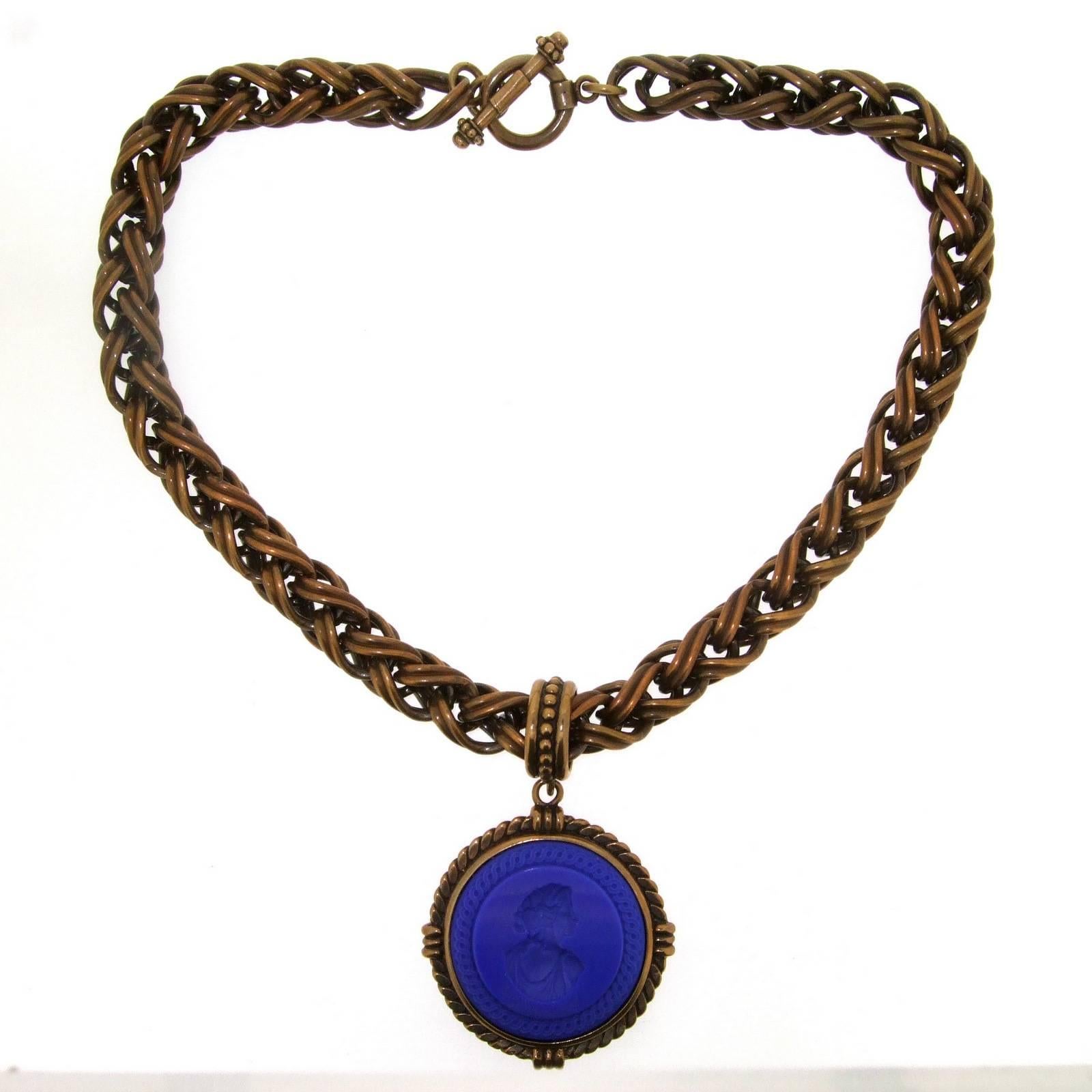 Stunning charm pendant necklace by Extasia with a beautiful blue German glass intaglio in bronze chain.