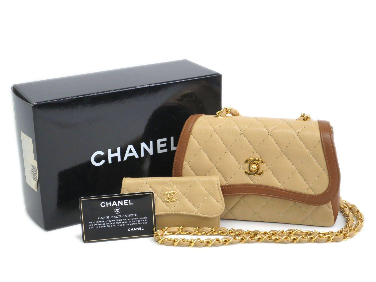 CURATOR'S NOTES

Yowza!  This sophisticated two-tone vintage Chanel shoulder bag is a CoCo collector's dream.  Well maintained and preserved, this rich beige beauty boasts rich gold hardware, chocolate trim and interior pouch.  

Priced to sell.