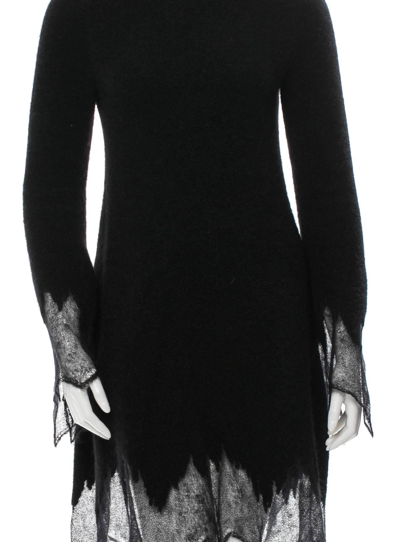 CURATOR'S NOTES

WHOA! PRICE REDUCED THIS WEEKEND ONLY!

Go from the office to date night with this unique black Chanel long sleeve dress. Featuring a sexy asymmetric sheer hem and keyhole at back, he will approve.

Style tip: Adorn the