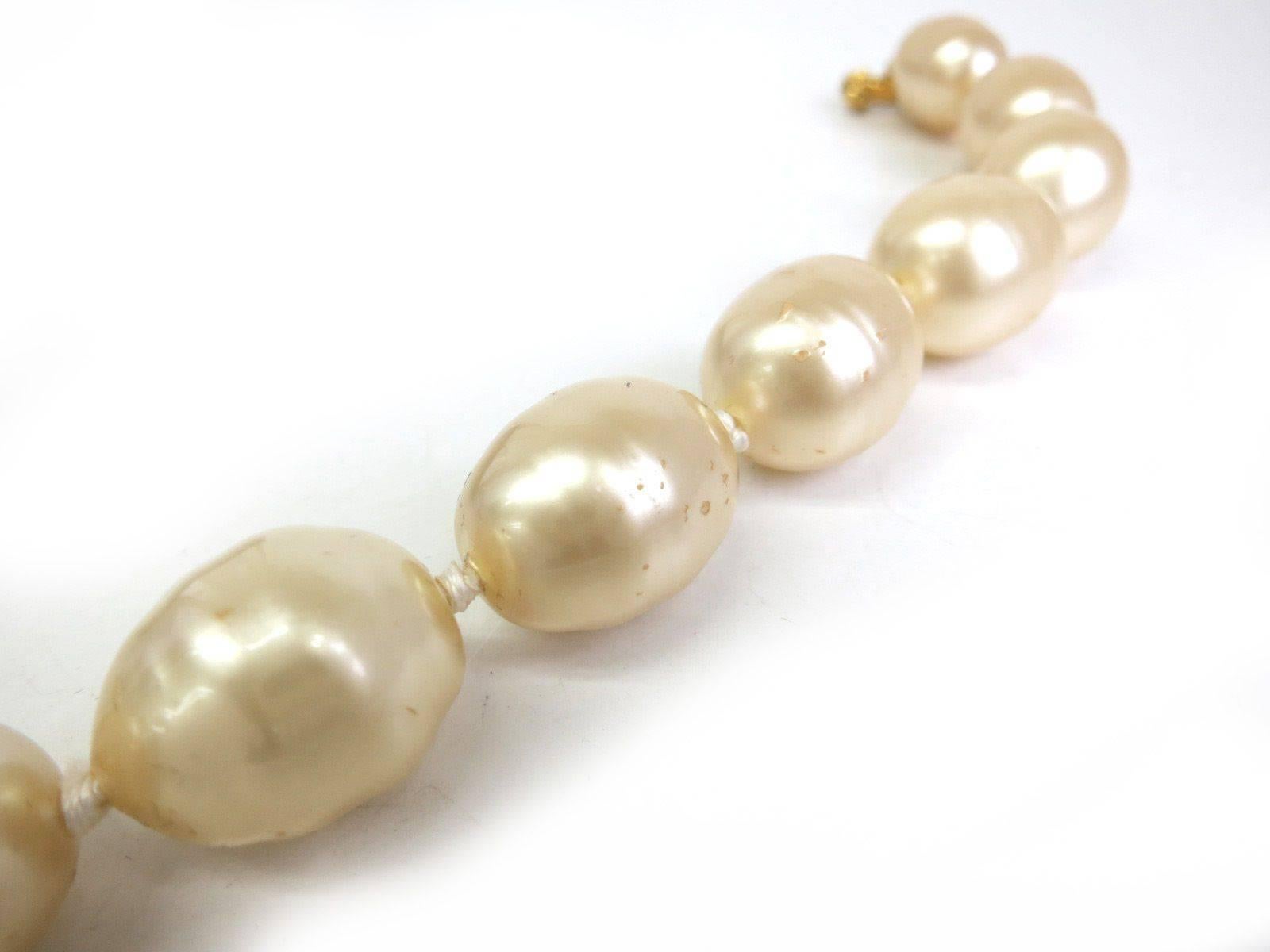 CURATOR'S NOTES

YOWZA!  LIMITED TIME PRICE REDUCTION!

Ladies love pearls--and even more if they are Chanel!  Elegant single strand Chanel pearls featuring beautiful gold toggle closure.  A must-have for vintage Chanel connoisseurs! 

Gold
