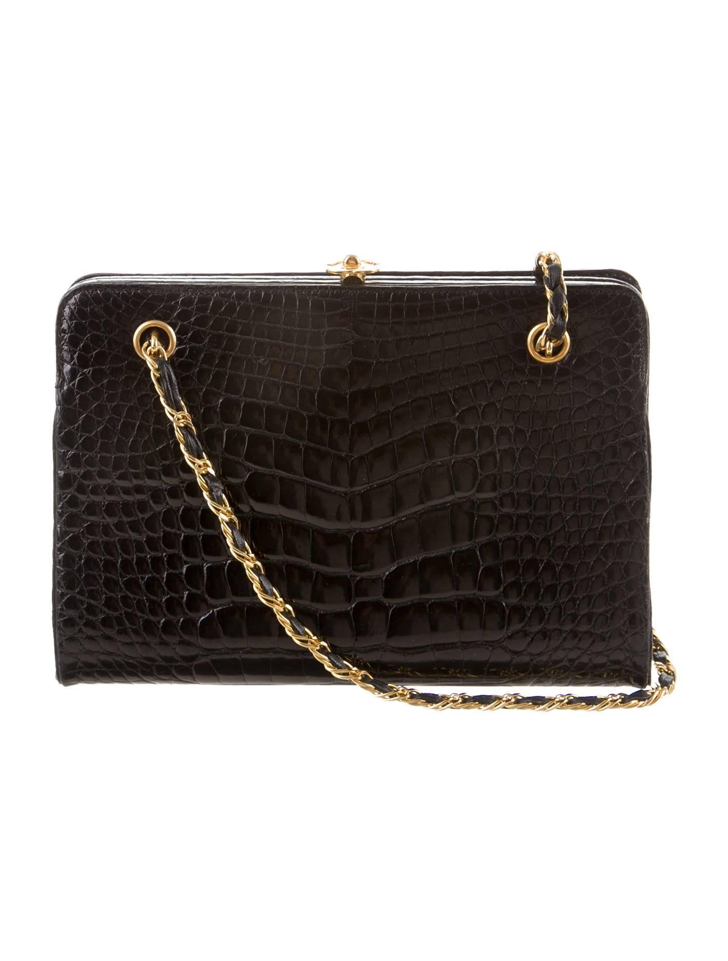 CURATOR'S NOTES

The holy grail of Chanel bags: The black alligator flap with gold CC kiss lock closure! Well maintained and preserved, this is a rare classic and collectible.

Alligator
Gold hardware
Leather interior
Two interior