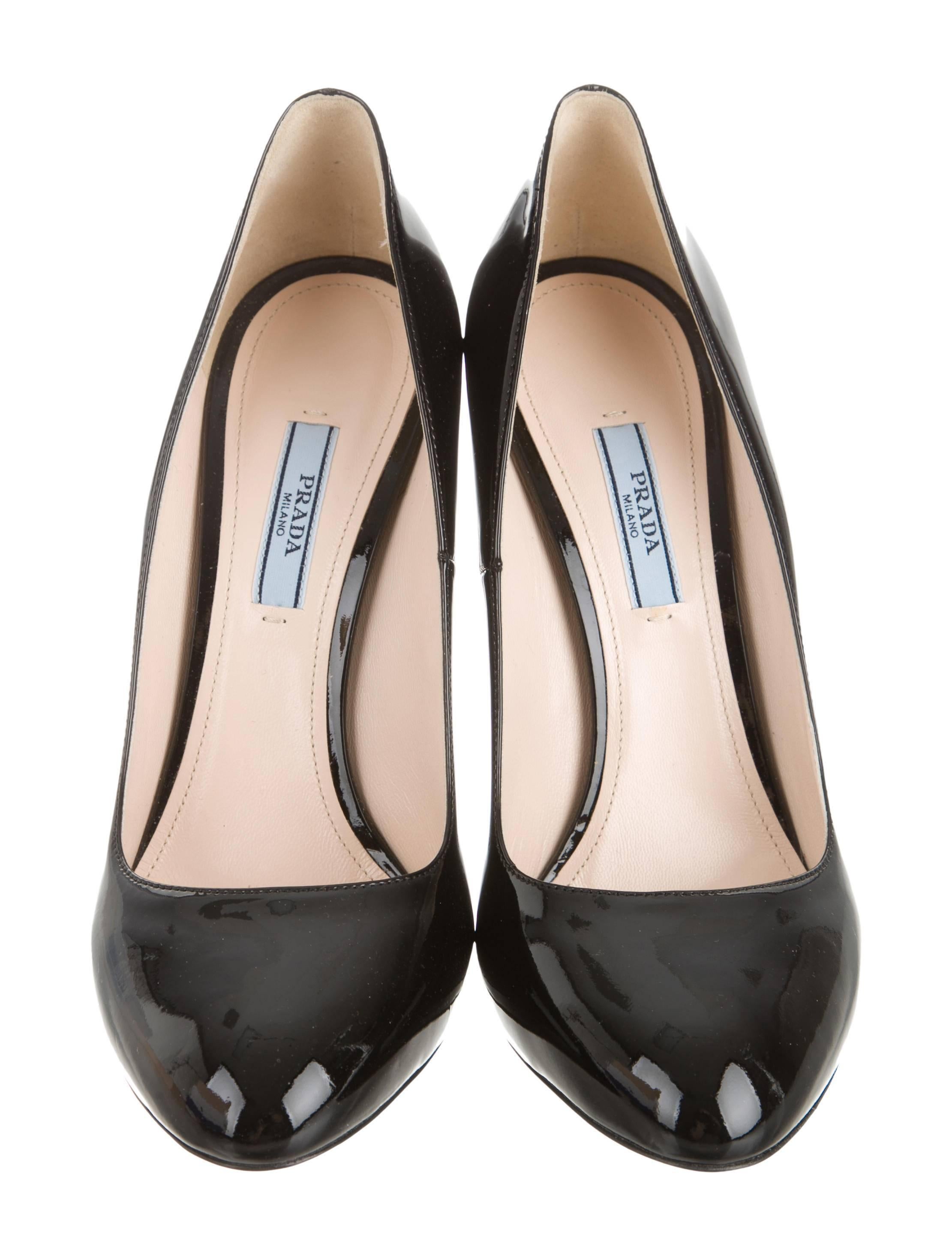 CURATOR'S NOTES

Black patent leather Prada pumps with semi pointed toes, tonal stitching and silver-tone covered heels. Includes original Prada box and dust bag.

Size IT 39.5 (US 9.5)
Patent leather
Silver hardware
Made in Italy
Heel