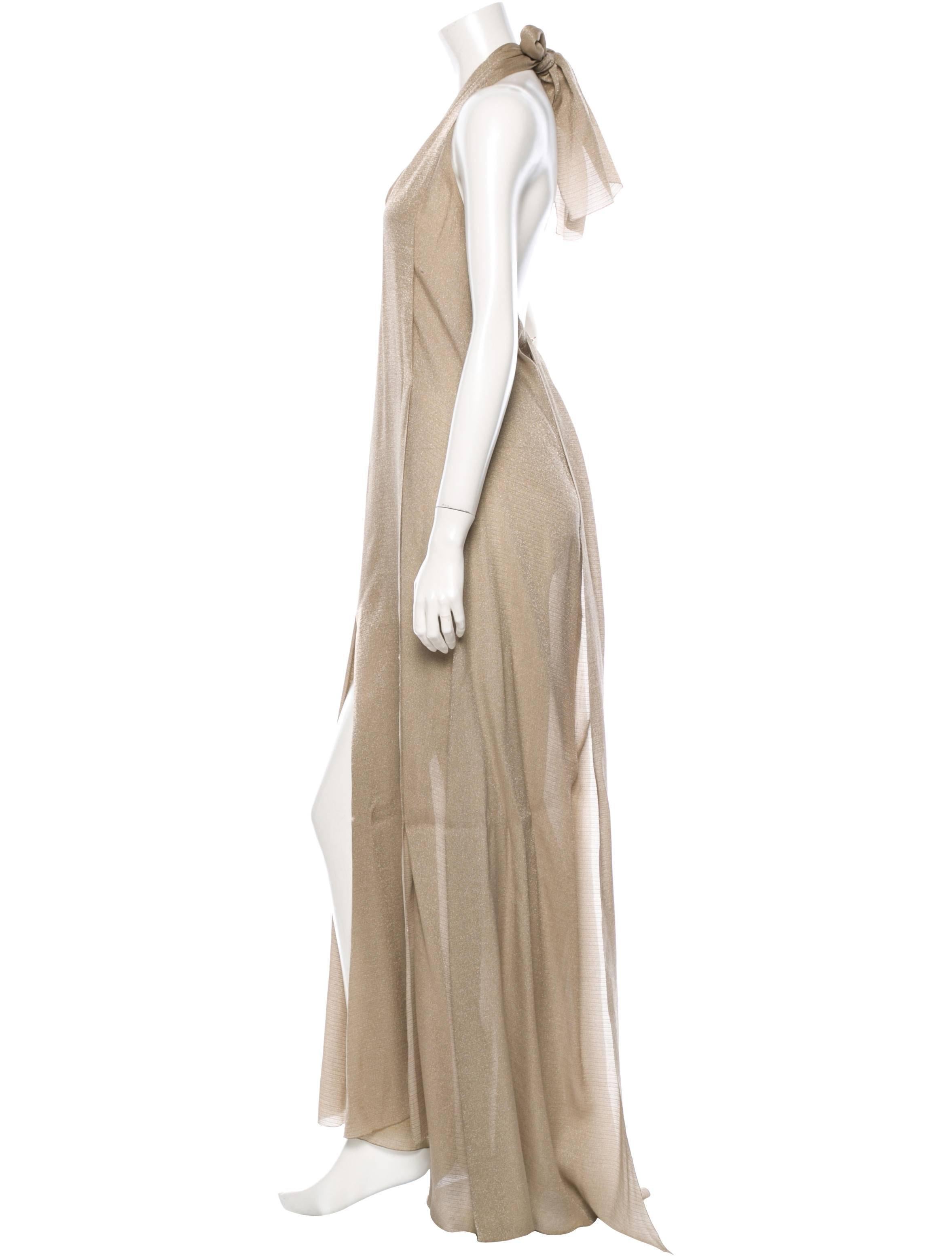 CURATOR'S NOTES

Wedding season is upon us1  Be the best dressed guest decked out in this gorgeous Chanel halter dress featuring V-neckline, hem slits, back sash ties and back concealed zip closure. 

Size FR 42 (US 10)
Bust 38”
Waist 42”
Hip