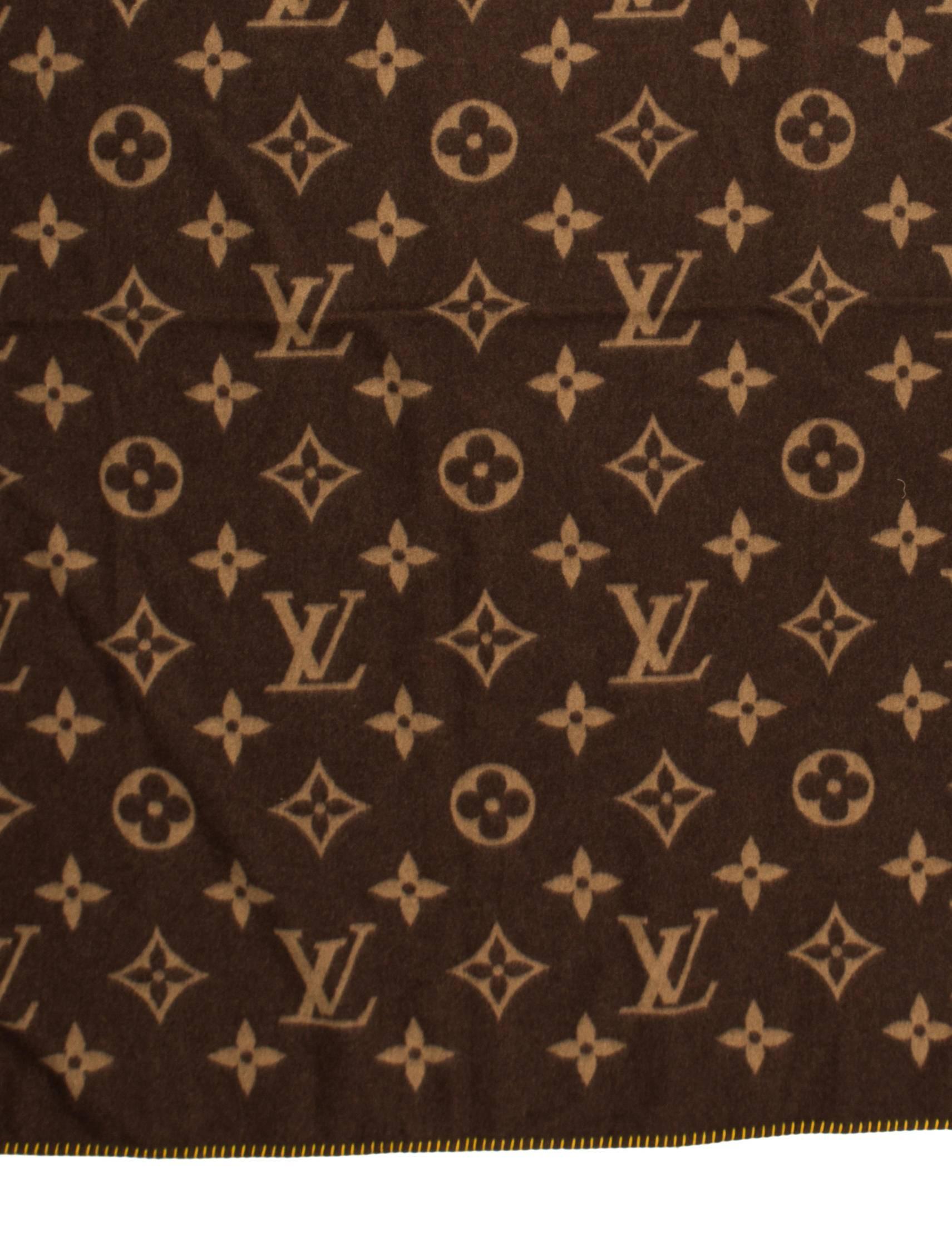 CURATOR'S NOTES

Cuddle up in style with this chic Louis Vuitton brown monogram throw blanket featuring LV logos and yellow stitching.  Includes the original Louis Vuitton box and dust bag making the perfect gift for the Louis Vuitton lover in