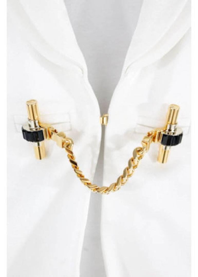 CURATOR'S NOTES  

You can thank us later for sourcing this beautifully rich brand NEW Gucci white sateen blazer! Just in time for the warm weather, this staple features a statement chain closure and long lapel, making it a timeless style sure to