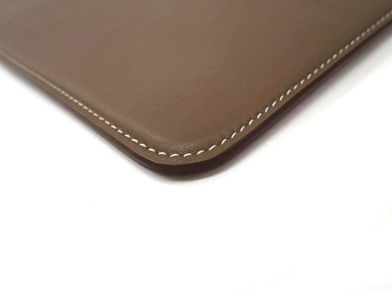 CURATOR'S NOTES

Hermes Brown Leather iPad Tech Accessory Carrying Case in Dust Bag  

Swift leather
Made in France
Date Code Square Q 
Measures 7.9" W x 9.8" H 
Includes original Hermes dust bag 