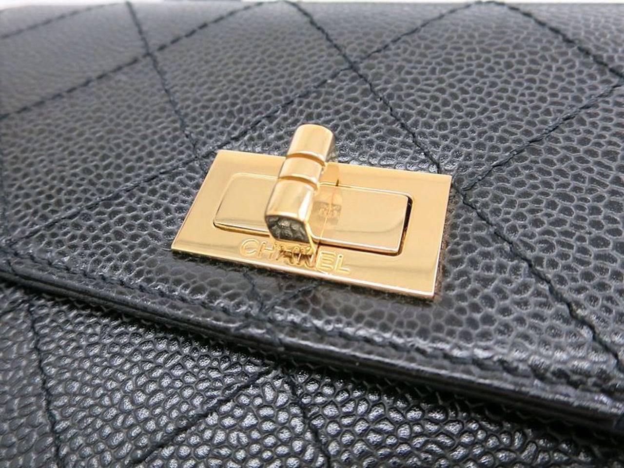 CURATOR'S NOTES

Chanel Black Caviar Leather Gold Kelly Style Box Top Handle Satchel Bag in Box  

Pfff! Hermes has nothing on me.  Gorgeous Chanel Kelly Style bag.

Caviar leather
Gold hardware
Turnlock closure
Made in France
Date code