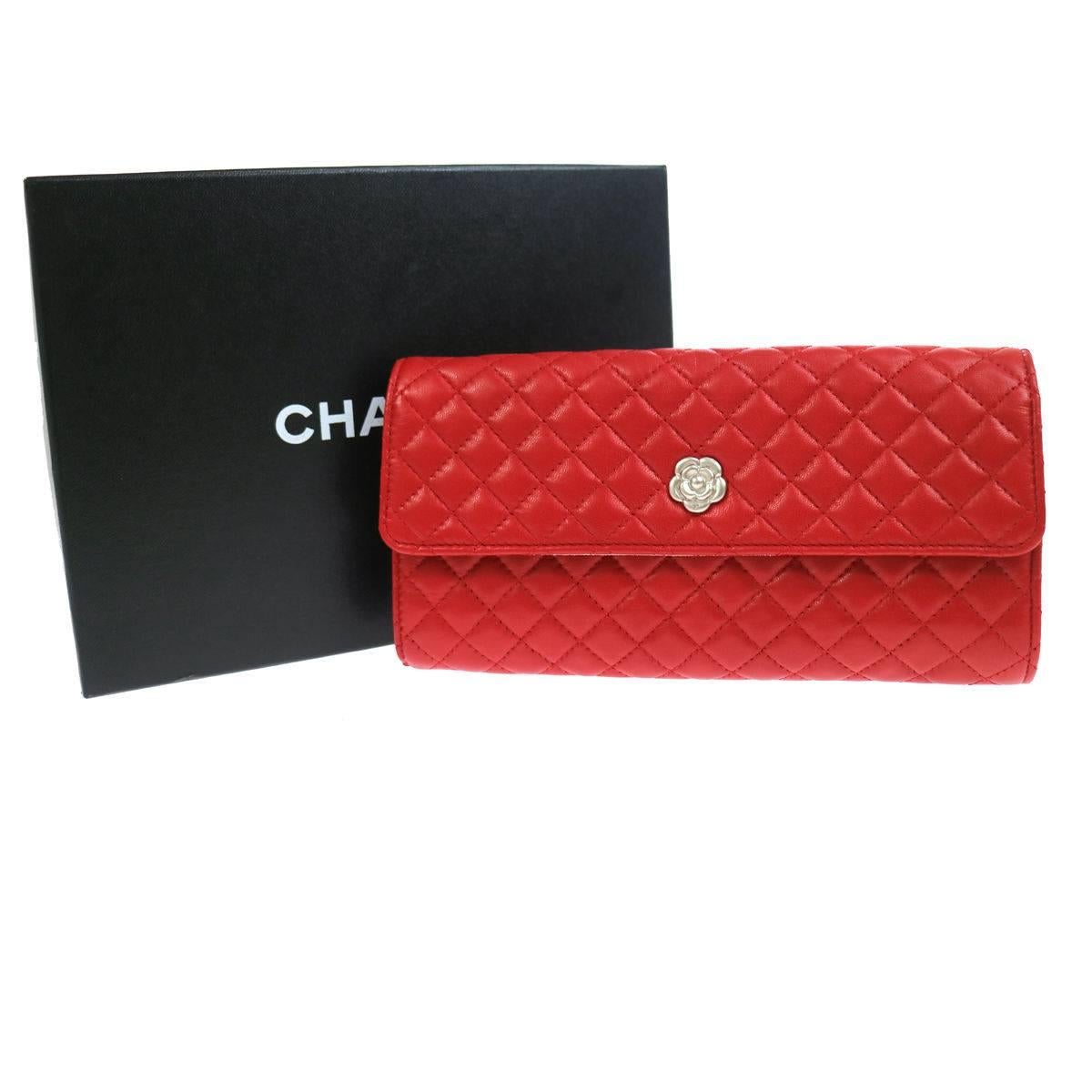 CURATOR'S NOTES

Store your Chanel in Chanel.  Chanel NEW Red Lambskin Jewelry Case Travel Clutch Bag Roll in Box

Lambskin
Silver hardware
Snap closure
Date code 15871678
Made in Italy
Measures 7.9" W x 4.7" H x 1" D 
Includes