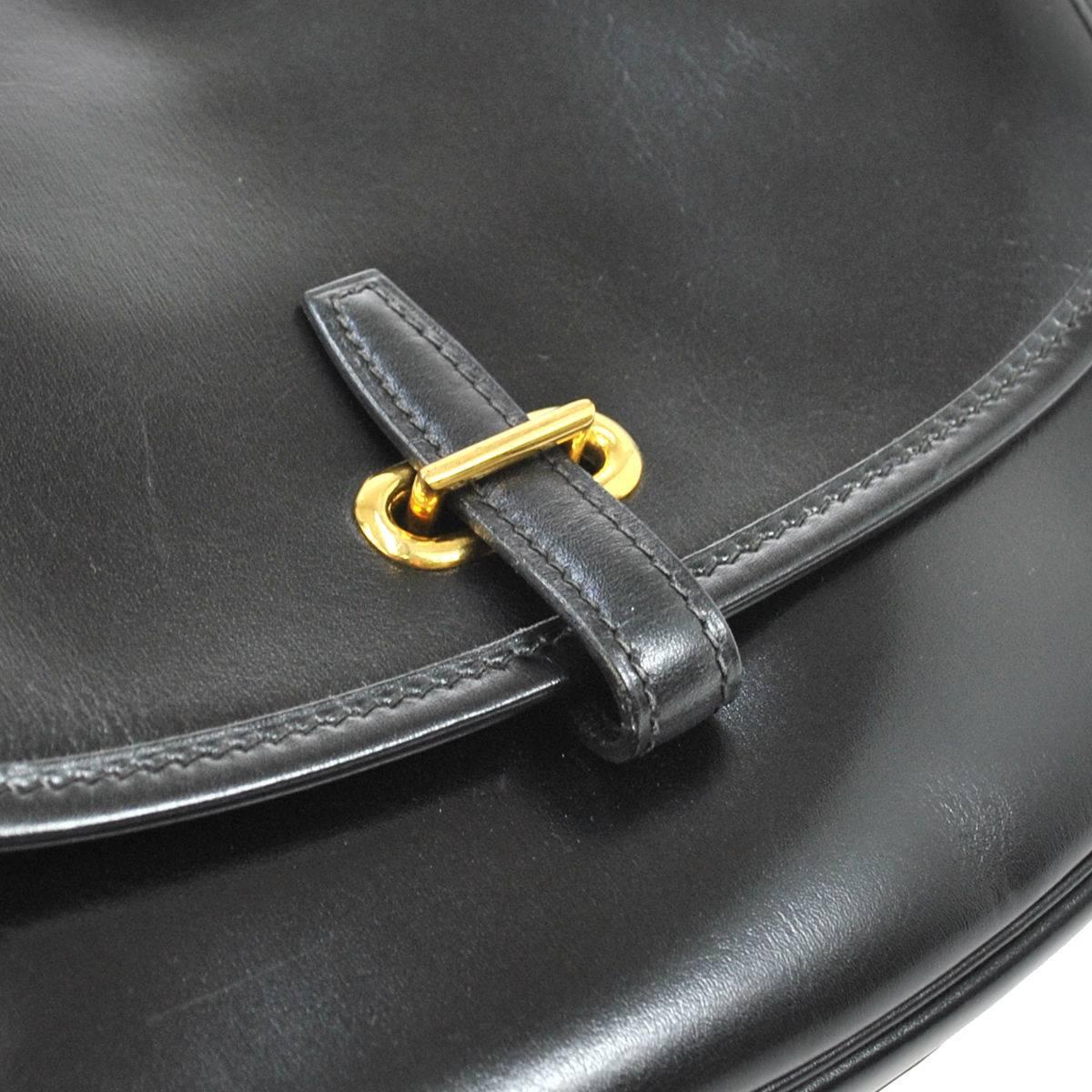 CURATOR'S NOTES

Hermes Vintage Black Leather Gold Hardware Evening Shoulder Crossbody Flap Bag  

Style Tip: Tuck the shoulder straps and wear as a clutch for ultimate versatility!

Leather
Gold hardware
Buckle closure
Made in France
Date code