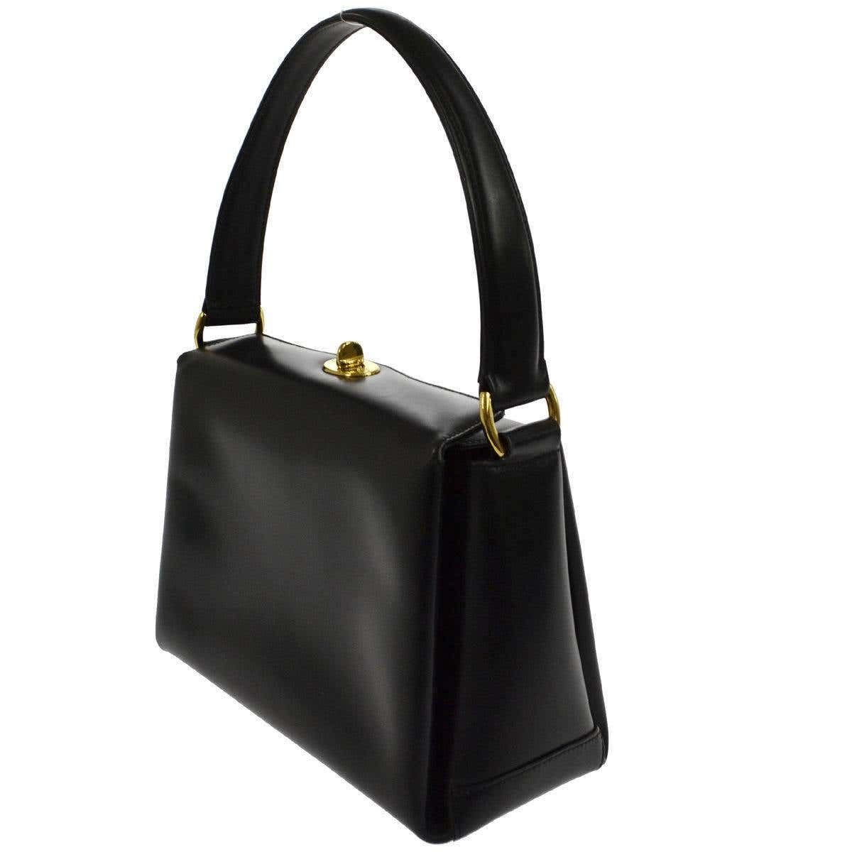 Gucci Black Leather Gold Twist Lock Top Handle Satchel Bag at 1stDibs ...