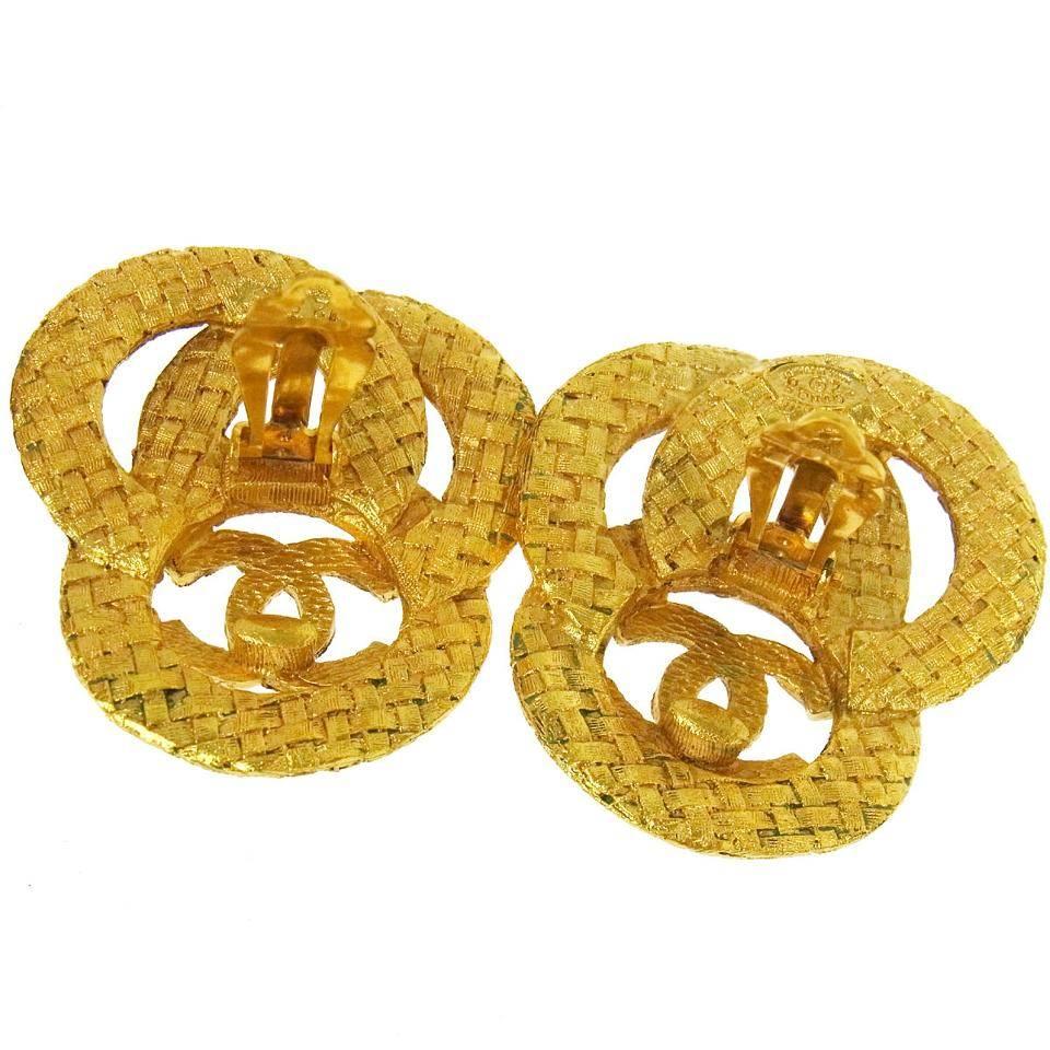 Metal
Gold tone
Clip on closure
Made in France
Width 1.6" 
Drop 1.8"
Includes original Chanel box