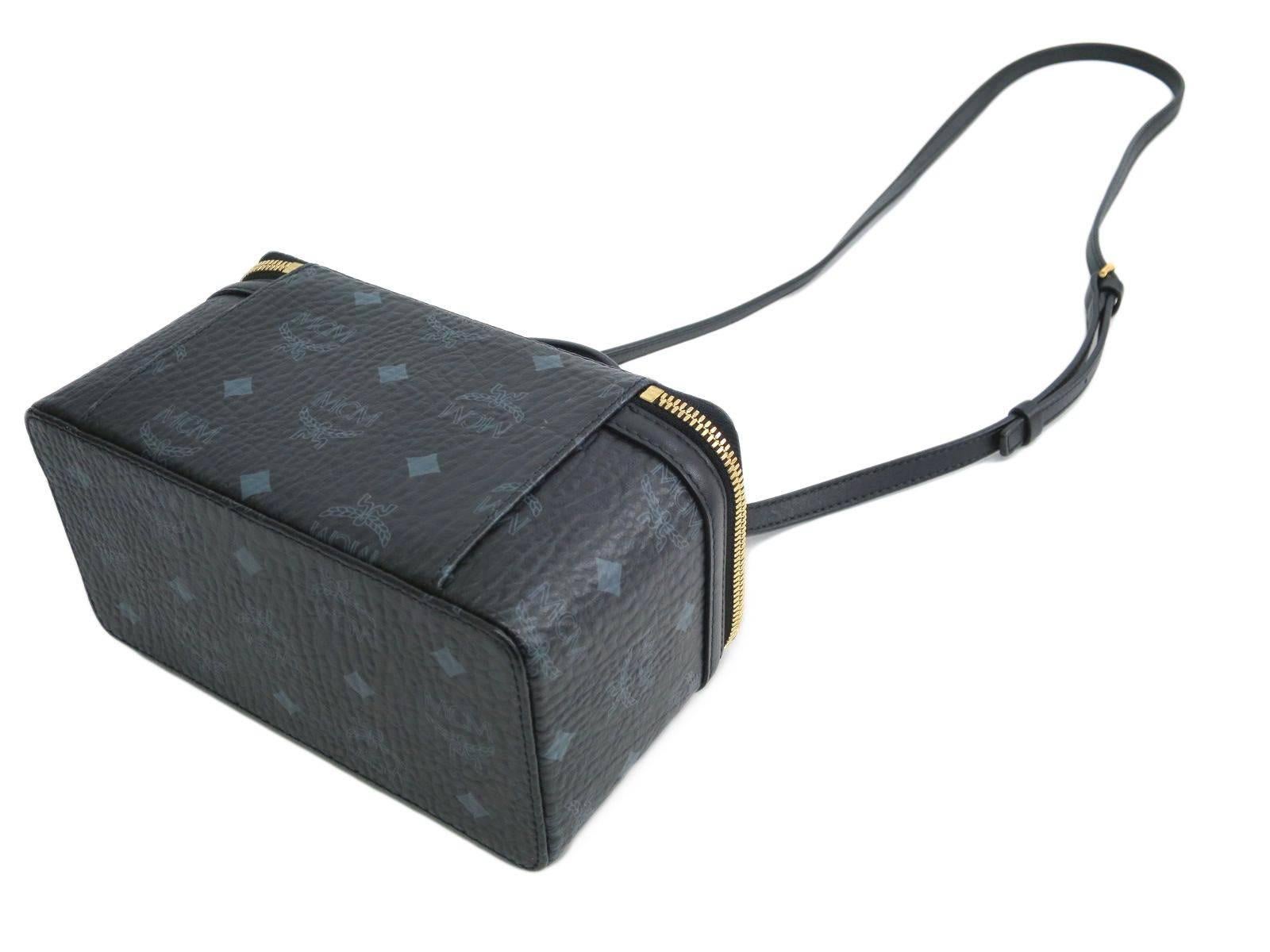 MCM Black Logo Monogram Gold Vanity Travel Top Handle Crossbody Shoulder Bag In Excellent Condition In Chicago, IL