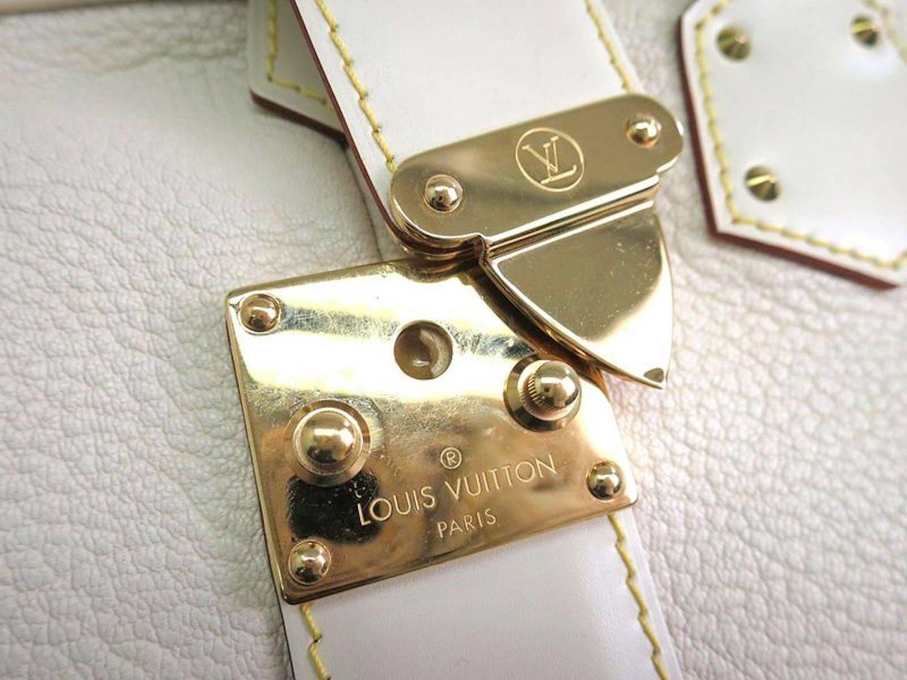 CURATOR'S NOTES

AMAZING price reduction for a limited time only!

Leather
Gold tone hardware
Slide lock closure
Made in France
Date code TH3057
Handle 13.5"
Measures 12.5" W x 8" H x 6" D
