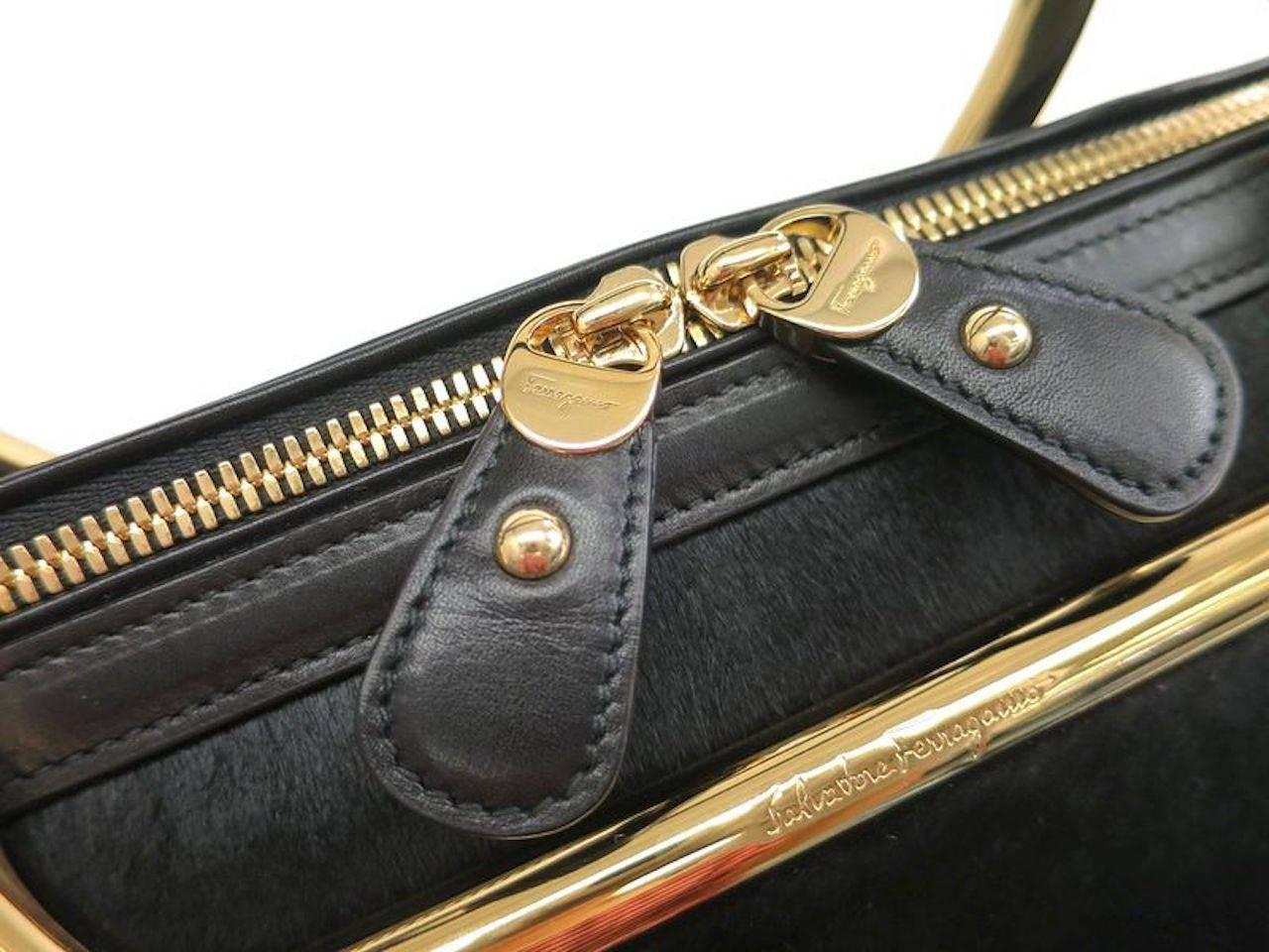 Salvatore Ferragamo Black Leather Gold Evening Top Handle Satchel Bag In Excellent Condition In Chicago, IL