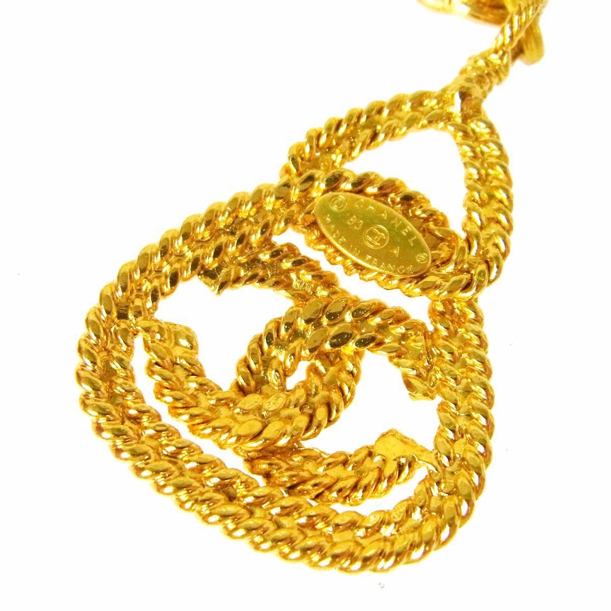 Chanel Vintage Gold Textured Brass Single Strand Medallion Charm Necklace In Excellent Condition In Chicago, IL