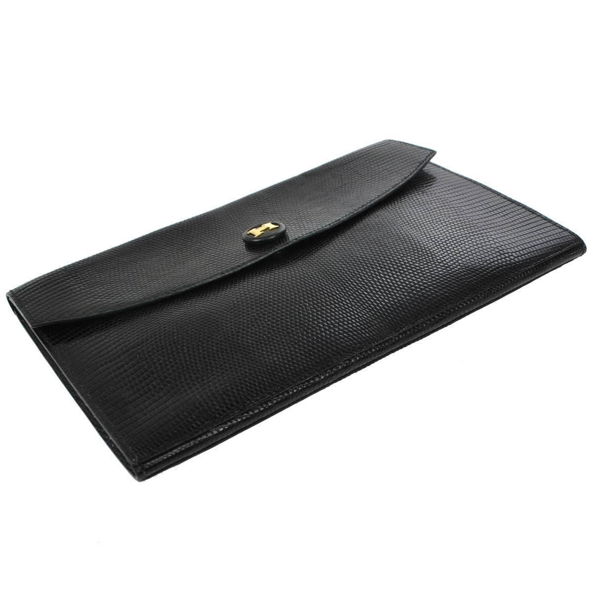 CURATOR'S NOTES

Hermes Rare Vintage Black Lizard Leather Gold Attache Envelope Evening Flap Bag 

Lizard
Gold tone hardware
Snap closure
Leather lining
Made in France
Date code Circle Y
Measures 9.5" W x 6.5" H x 0.50" D 
