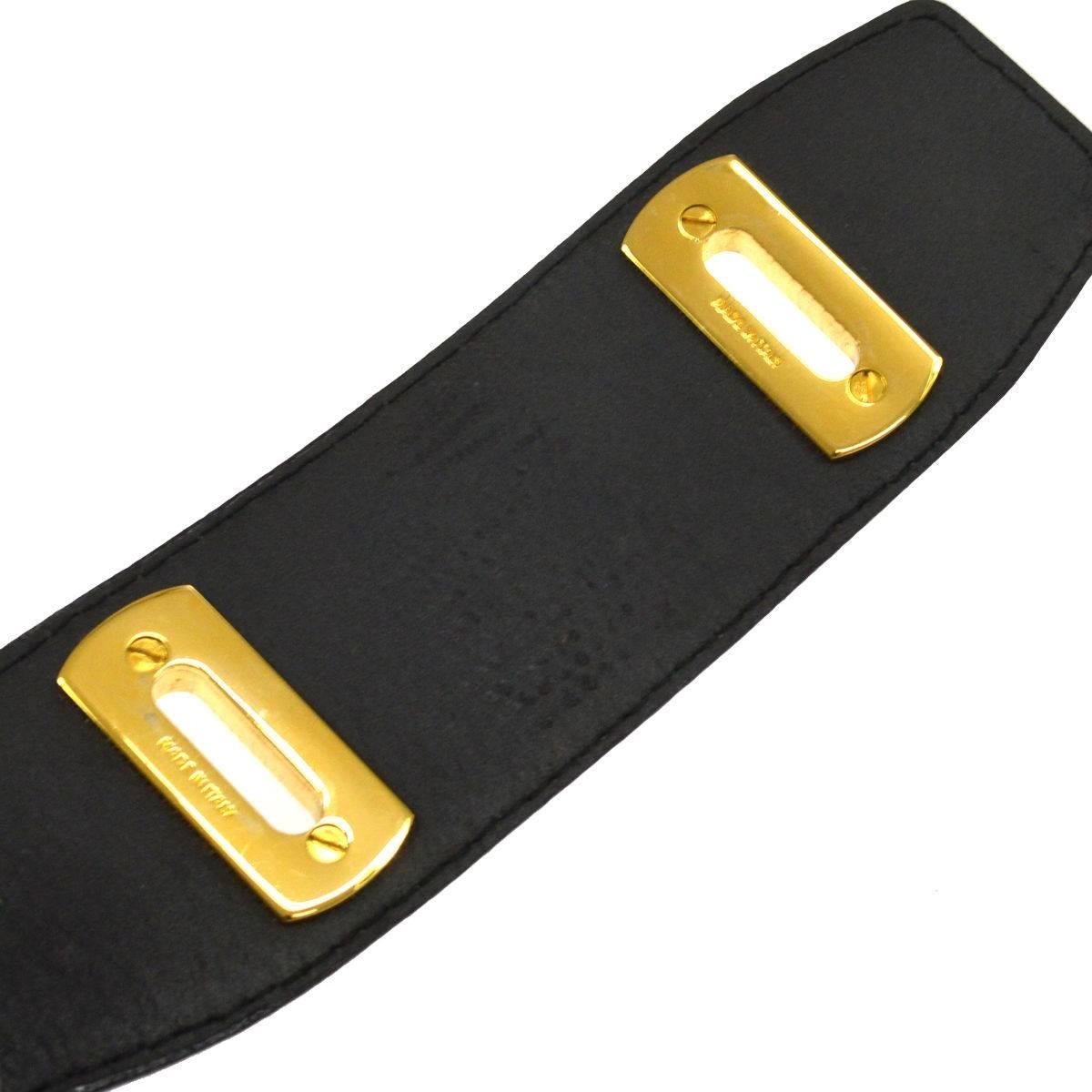 Salvatore Ferragamo Black Leather Embossed Gold Logo Toggle Waist Belt In Good Condition In Chicago, IL