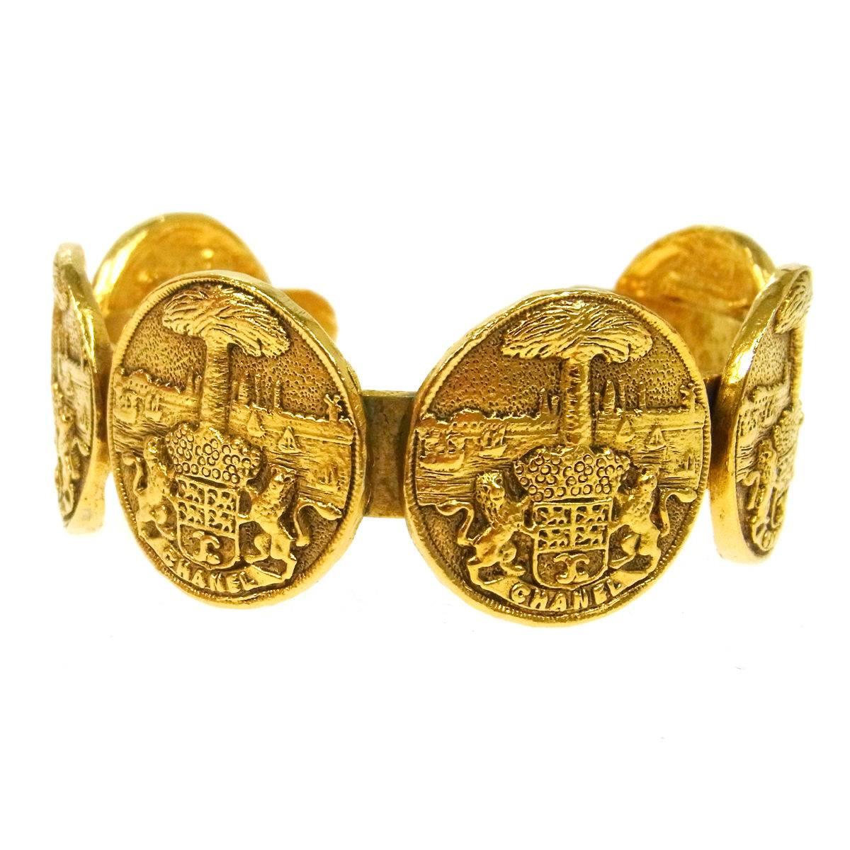 Chanel Vintage Gold Textured Dual Lion Round Coin Charm Evening Cuff Bracelet