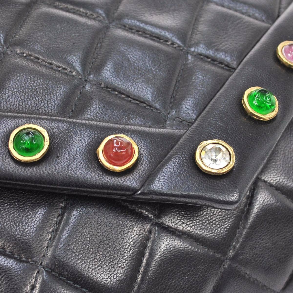 CURATOR'S NOTES

Chanel Vintage Rare Black Lambskin Multi Color Gripoix Evening Clutch Flap Bag 

Lambskin
Gripoix
Gold tone hardware 
Date code 0466217
Made in Italy
Shoulder strap drop 18"
Measures 8" W x 6" H x 2" D 
Includes