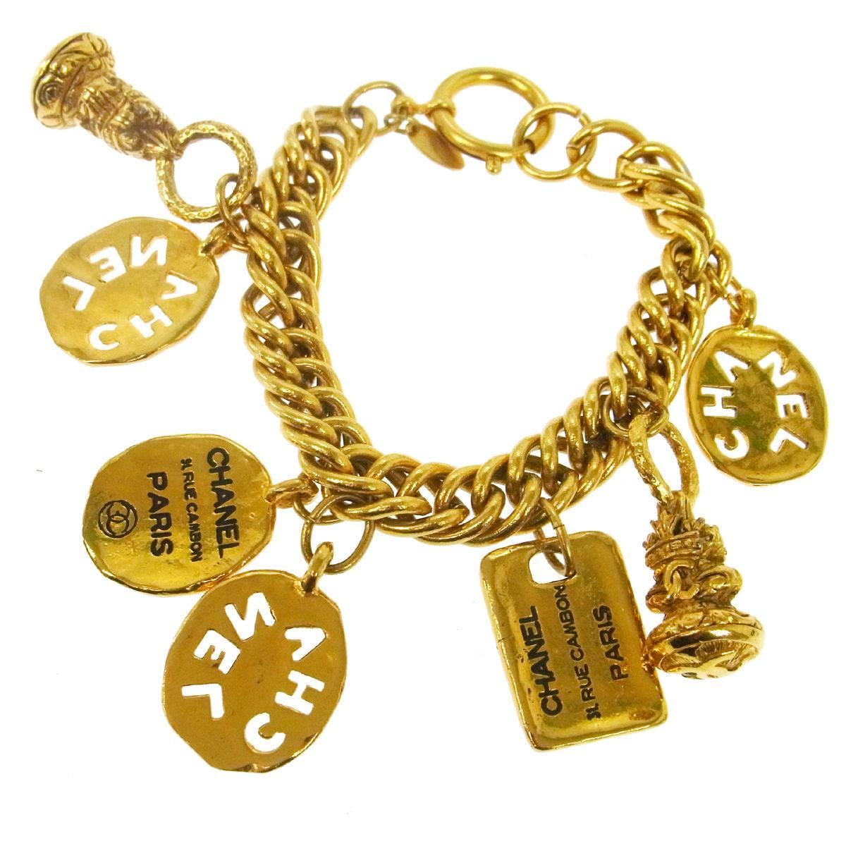 Chanel Gold Multi Charm Dangle Bracelet 