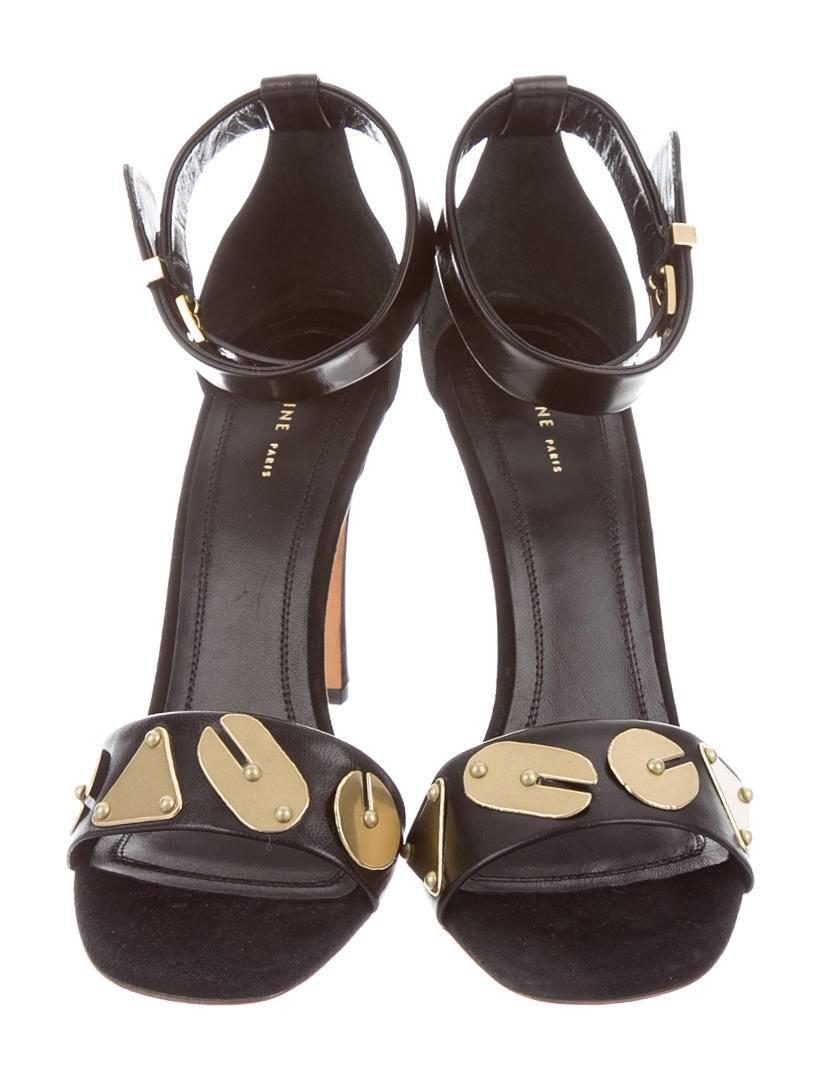 CURATOR'S NOTES

Celine NEW & SOLD OUT Black Leather Gold Mirror Heels in Box  

Size IT 36
Leather
Gold tone hardware
Adjustable ankle strap closure
Made in Italy
Heel height 4.25"
Includes original Celine dust bag and box