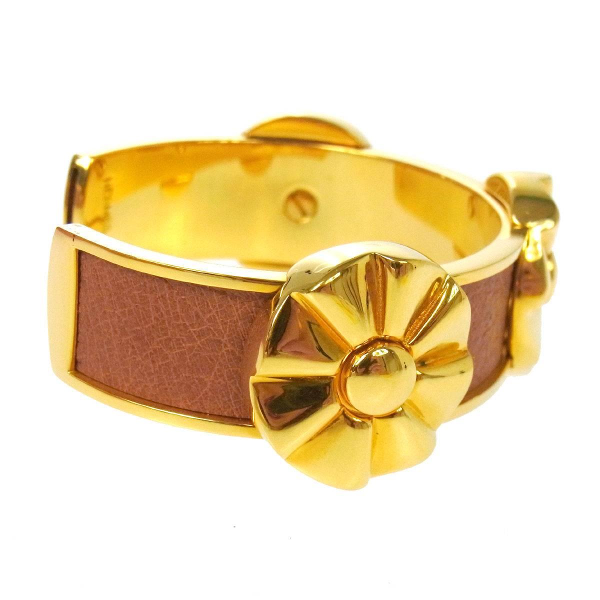 Hermes Cognac Tan Leather Gold Flower Charm Evening Cuff Bracelet in Box In Good Condition In Chicago, IL