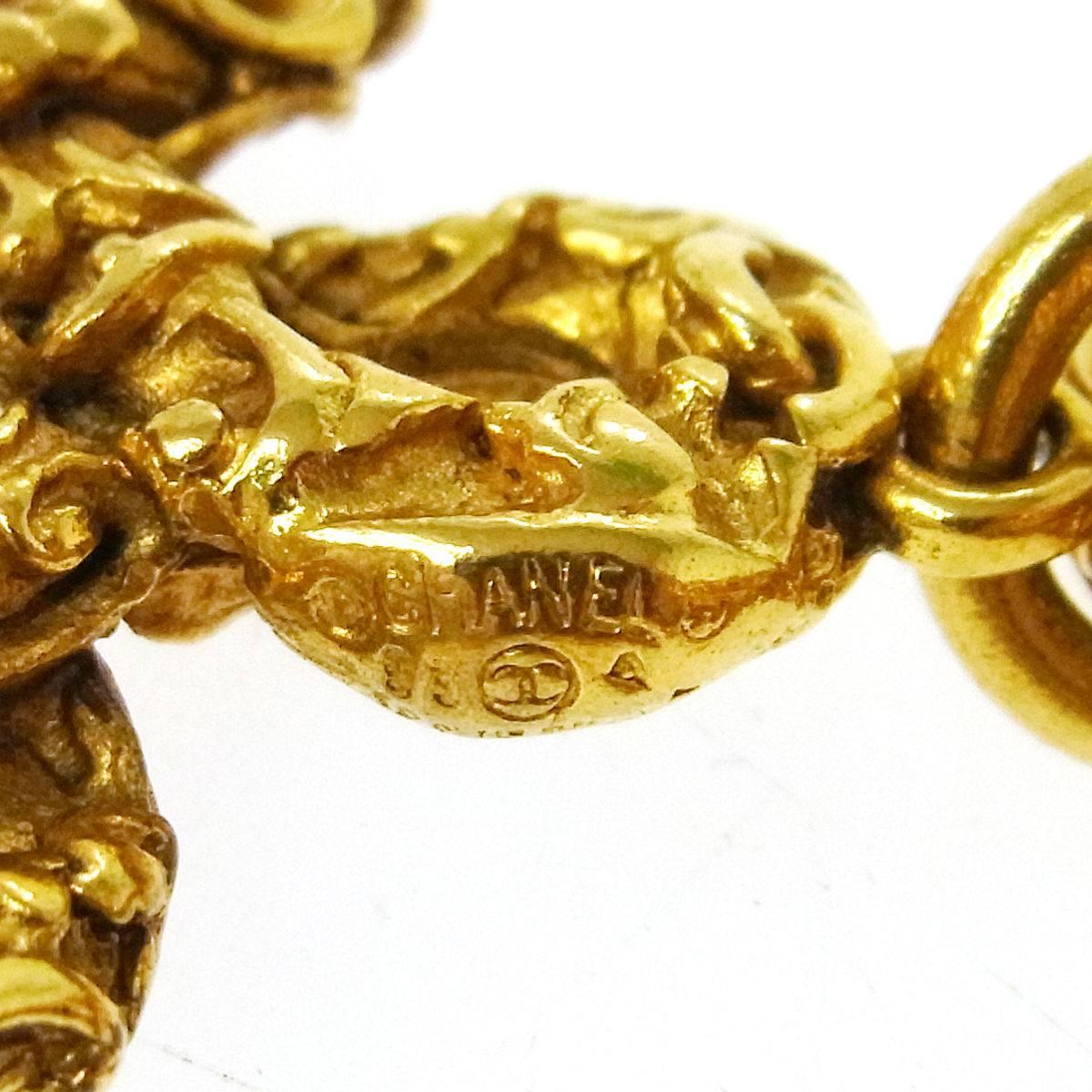 Chanel Vintage Gold Textured Charm Link Bracelet

Metal
Gold tone
Lobster claw closure
Made in France
Charm diameter 1