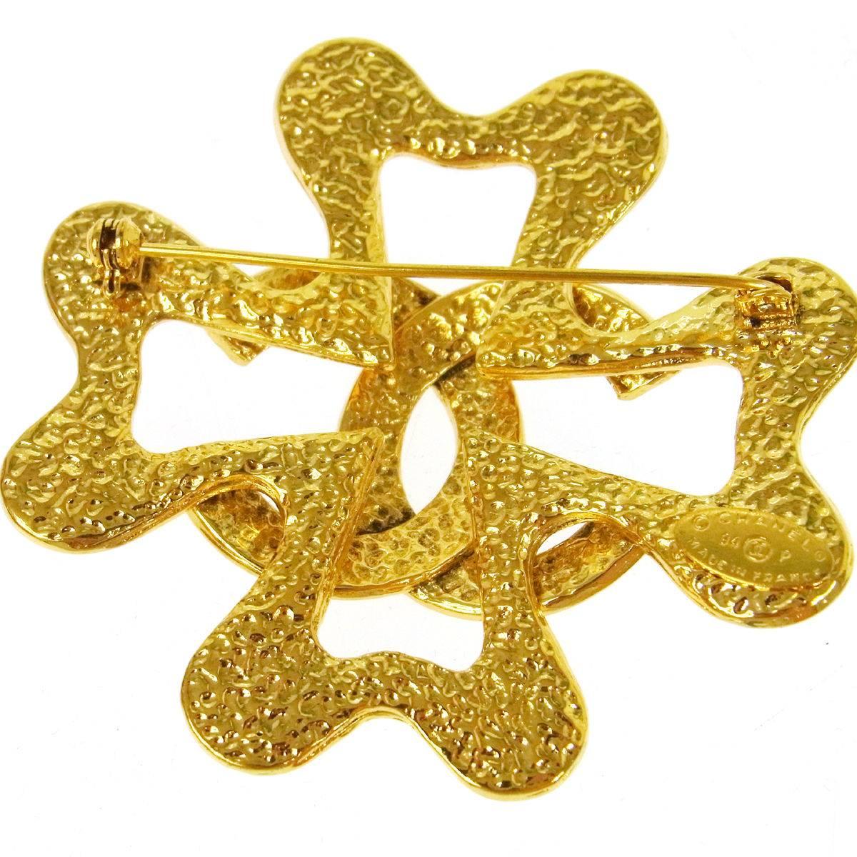CURATOR'S NOTES

Talk about a statement piece!  This gorgeous Chanel cross brooch is substantial in size to kick any outfit into high gear!

Metal
Gold tone
Pin closure
Made in France
Measures 2.5" W x 2.5" H

Shop Newfound Luxury for