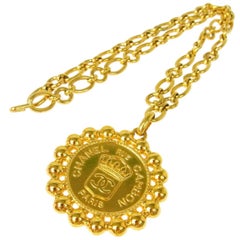 Chanel Vintage Gold Large Round Coin Charm Rue Cambon Pendant Evening Necklace