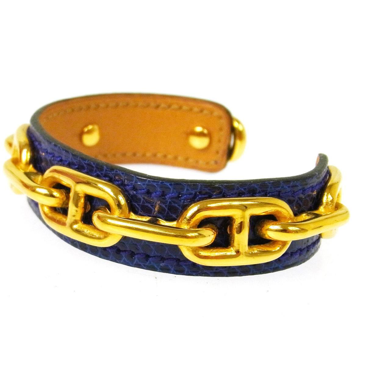 Hermes Gold Chain Leather Charm Cuff Bracelet 

Leather
Metal
Gold tone
Slip on closure
Made in France
Width 0.5