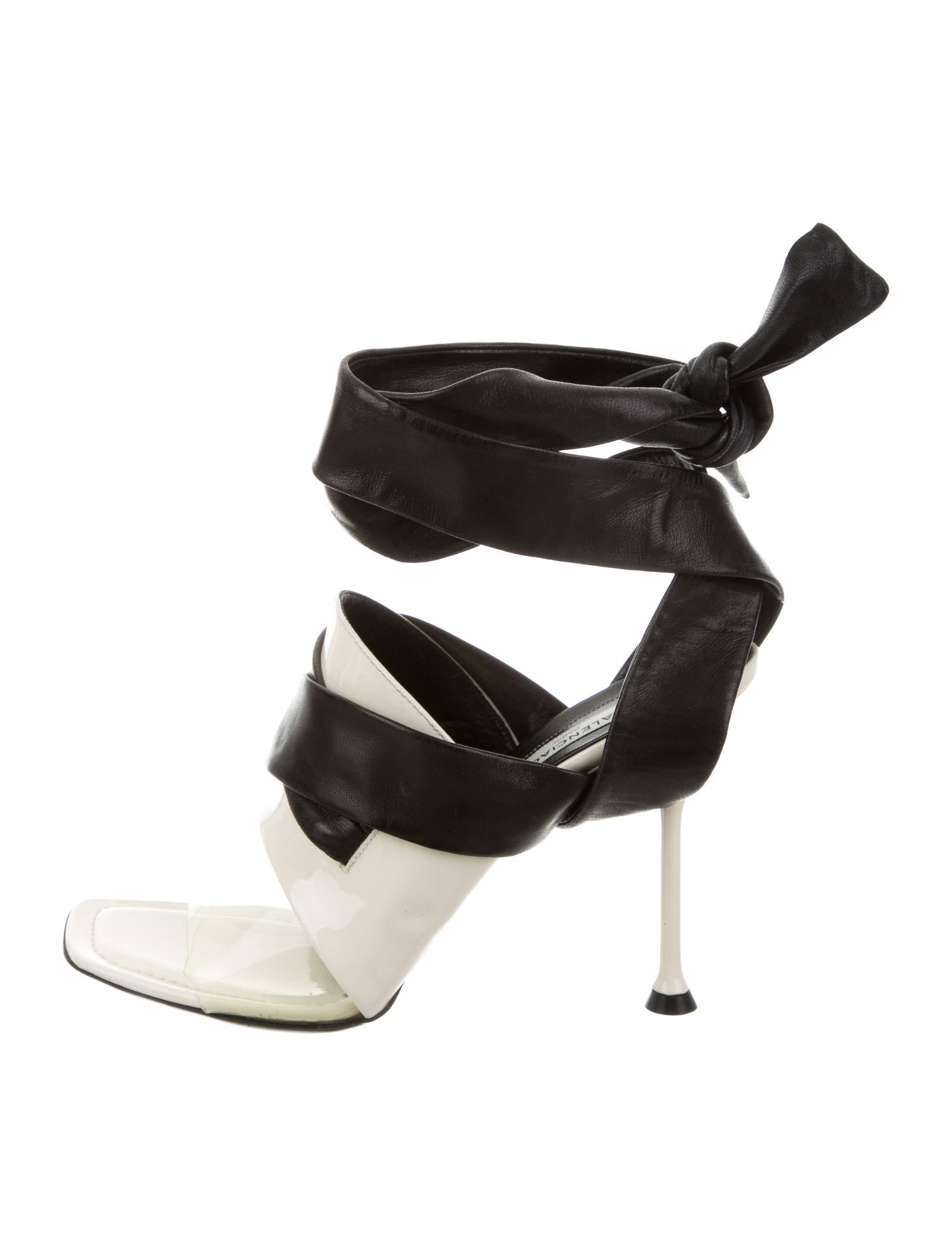 CURATOR'S NOTES

Balenciaga NEW & SOLD OUT Cut Out Heels in Box  

Size 37.5
Patent leather
PVC
Wrap around closure
Made in Italy
Heel height 4"
Includes original Balenciaga box