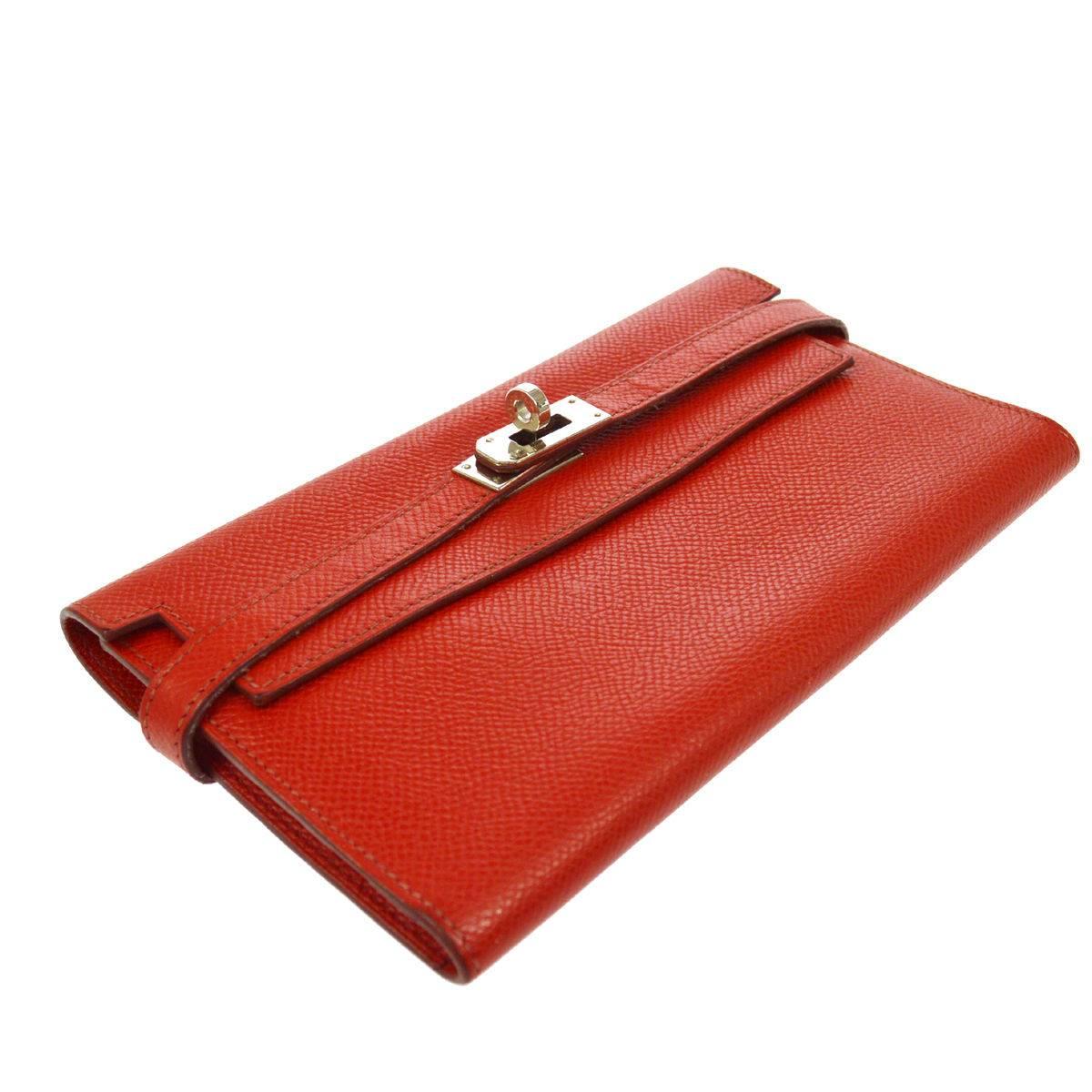 CURATOR'S NOTES

Hermes Leather Kelly Clutch Wallet  

Epson leather
Palladium hardware
Turnlock closure
Made in France
Measures 7.5" W x 4" H 

Shop Newfound Luxury for authentic Hermes Kelly wallets and bags.