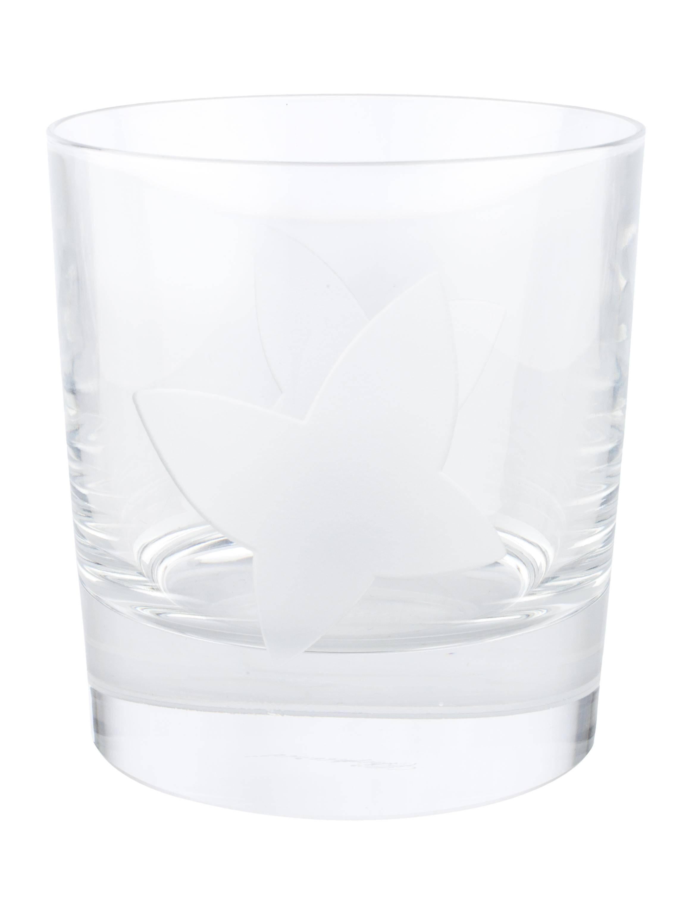 CURATOR'S NOTES

Crystal
Includes two glasses 
Height 3.75"
Diameter 3.5"
Includes original Cartier packaging 
