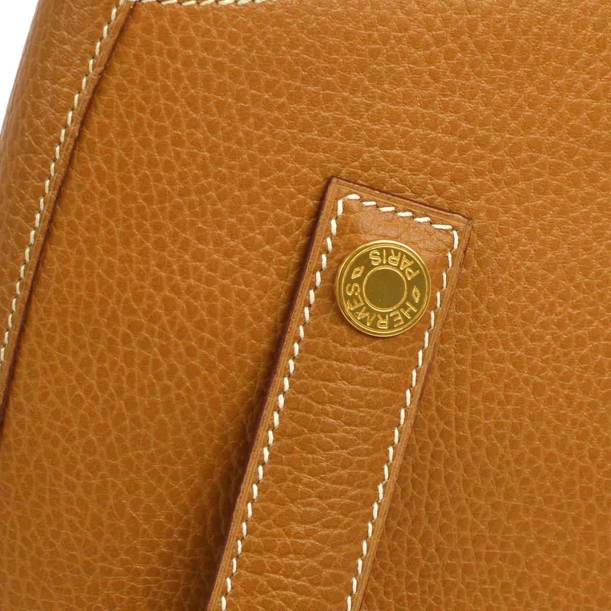 Hermes Vintage Cognac Leather Gold Bucket Shopper Carryall Shoulder Bag 

Leather
Gold tone hardware
Snap button closure
Date code Circle Z
Made in France
Shoulder strap drop 12
