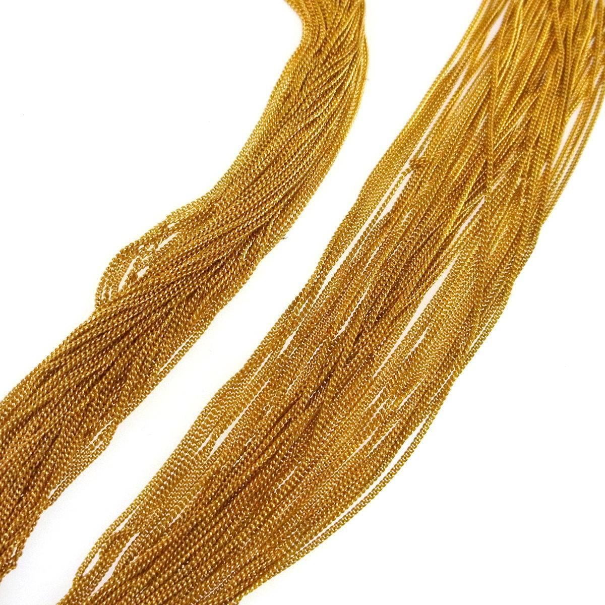 CURATOR'S NOTES

Gucci Gold Multi Strand Bamboo Drape Drop Evening Necklace  

Metal
Gold tone
Bamboo
Lobster claw closure
Made in Italy
Total length 35.5"