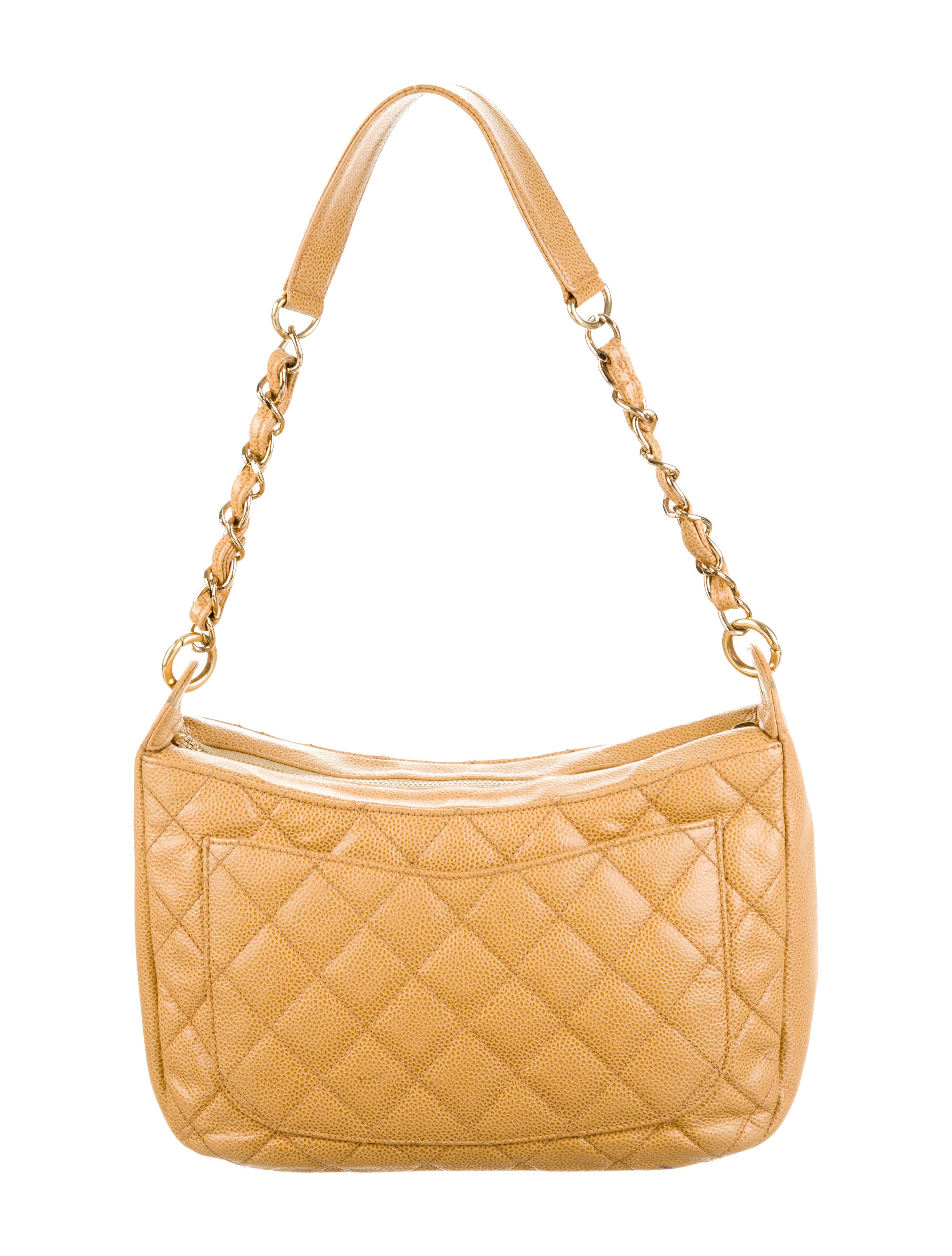 CURATOR'S NOTES

Chanel Nude Caviar Leather Gold Evening Top Handle Satchel Chain Shoulder Bag 

Caviar leather
Gold tone hardware 
Zipper closure
Made in France
Date code 8100679
Shoulder strap 10.5"
Measures 11" W x 6.5" H x 4"