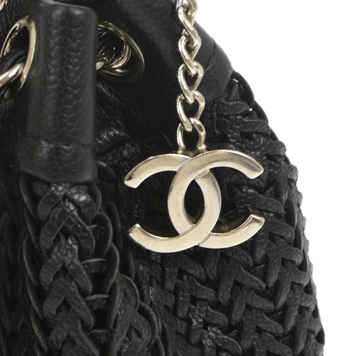 CURATOR'S NOTES

Chanel Black Caviar Leather Charm Drawstring Basket Weave Hobo Shoulder Bag  

Caviar leather
Silver tone hardware
Drawstring closure
Made in Italy
Date code 9874587
Shoulder strap drop 11"
Measures 12" W x 8.75" H x