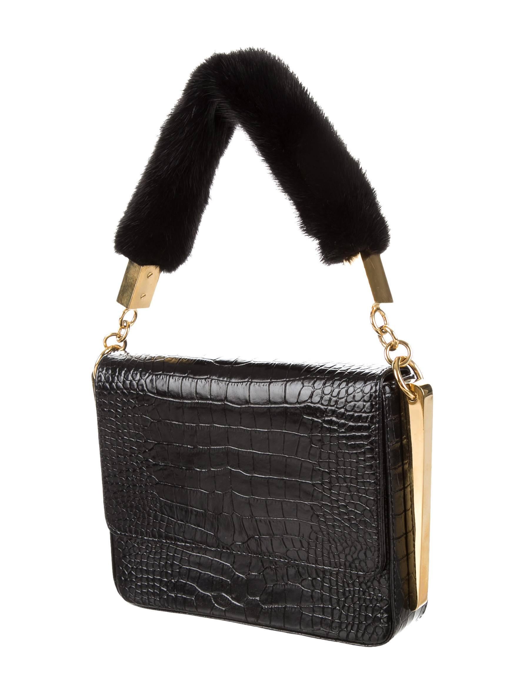 CURATOR'S NOTES

Giuseppe Zanotti Black Leather Gold Fur Evening Top Handle Shoulder Flap Bag  

Leather
Mink fur
Gold tone hardware
Woven lining 
Snap closure
Made in Italy
Shoulder handle strap drop 6"
Measures 7.75" W x 6" H x