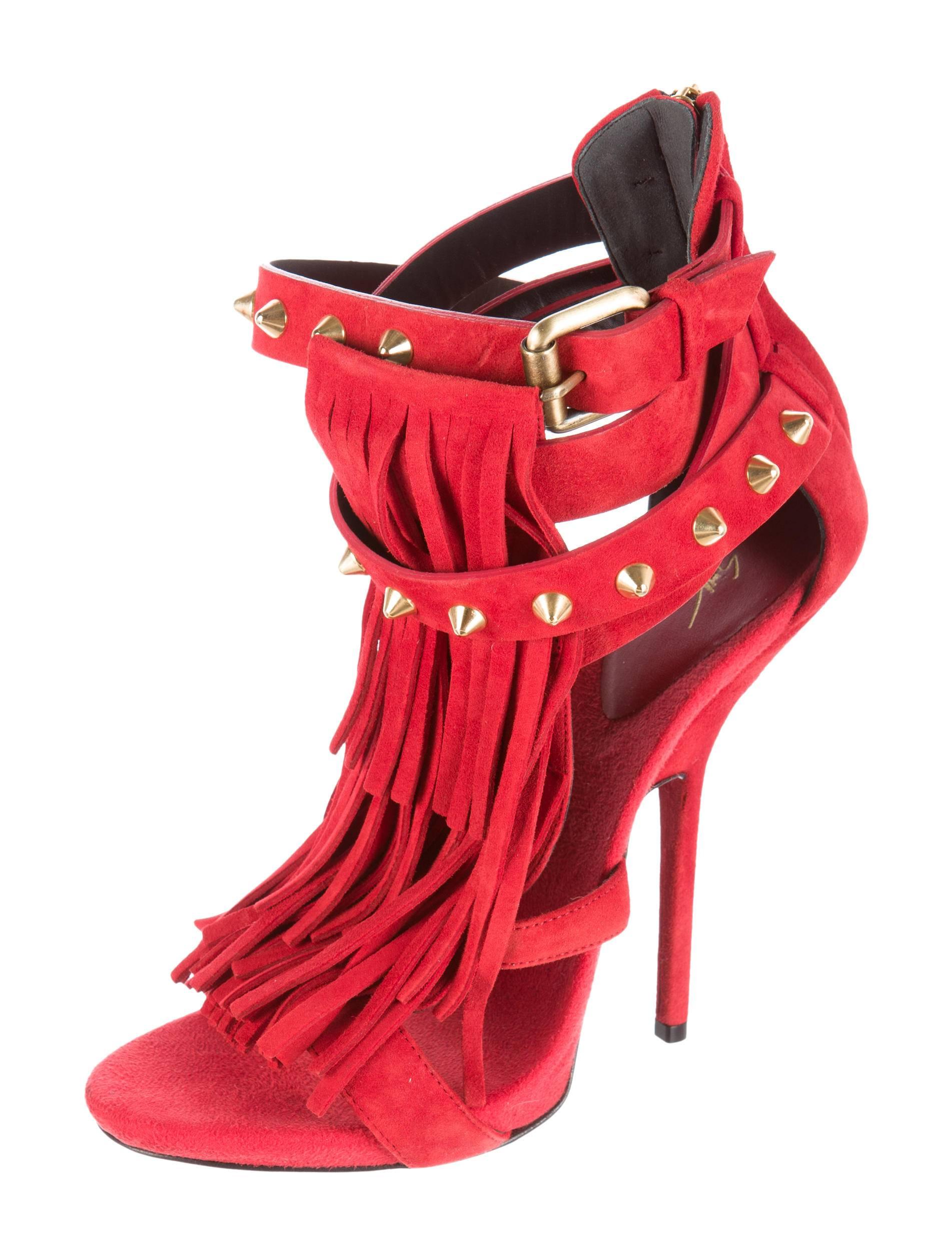 CURATOR'S NOTES

Giuseppe Zanotti New Red Suede Stud Tassel Sandals Heels in Box  

Size IT 39
Suede
Gold tone hardware
Buckle and zip closure
Made in Italy 
Heel height 5.25"
Includes original Giuseppe Zanotti dust bag and box 
