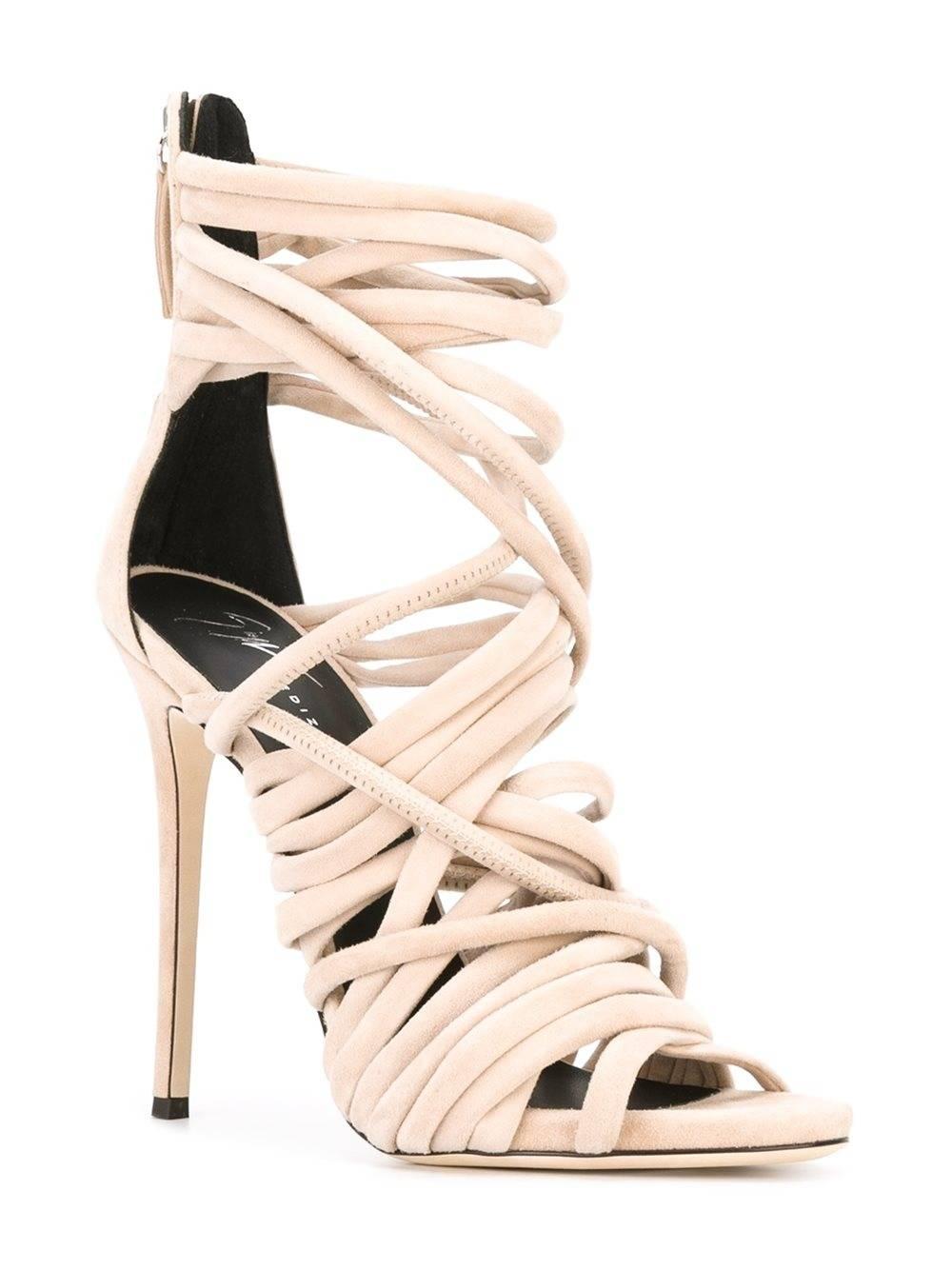 CURATOR'S NOTES  

Giuseppe Zanotti New Nude Suede Leather Strappy Heels in Box   

Size IT 36 
Suede Leather
Zipper closure 
Made in Italy 
Heel height 5