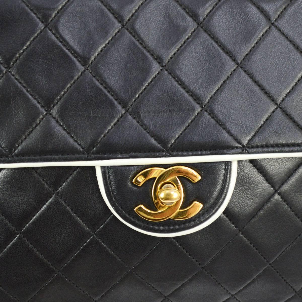 Chanel Vintage Black White Piping Gold Evening Shoulder Flap Bag 

Lambskin leather
Gold tone hardware
Turnlock closure
Leather lining
Made in France
Date code 5153505
Shoulder strap drop 17"
Measures 9" W x 7" H x 2.5" D