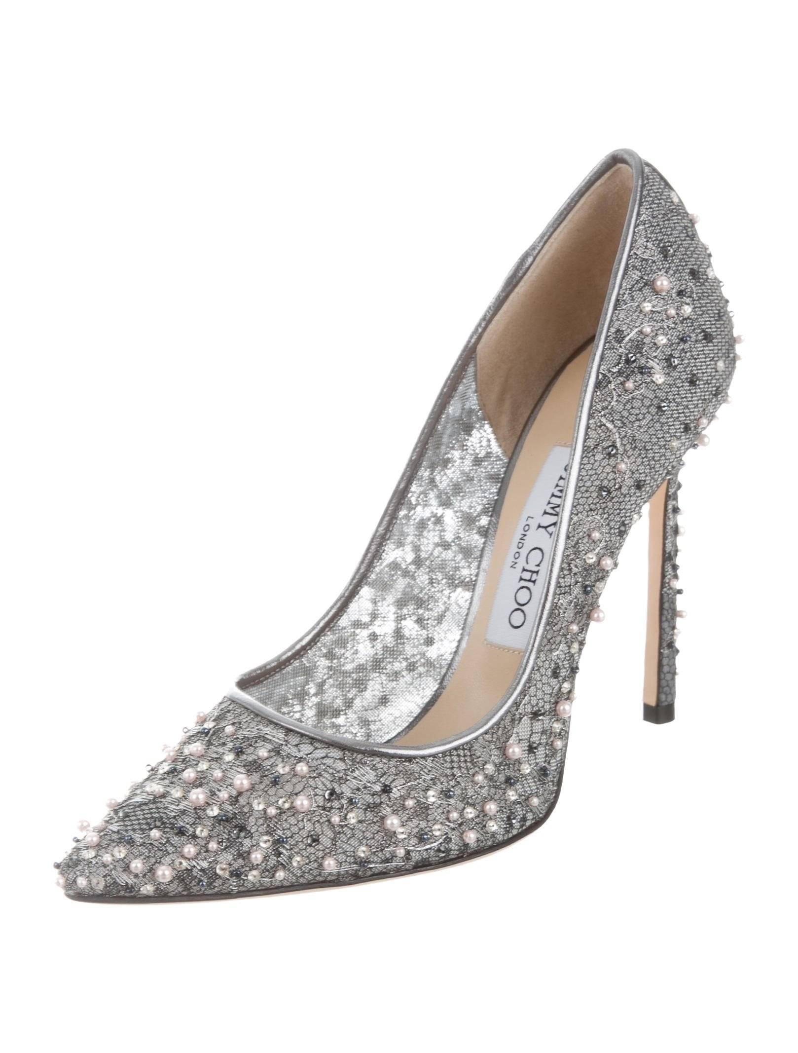 CURATOR'S NOTES

LAST PAIR!  Jimmy Choo New Sold Out Silver Pearl High Heels Pumps in Box  

Size IT 36
Mesh
Leather
Faux pearl
Made in Italy
Heel height 4.3