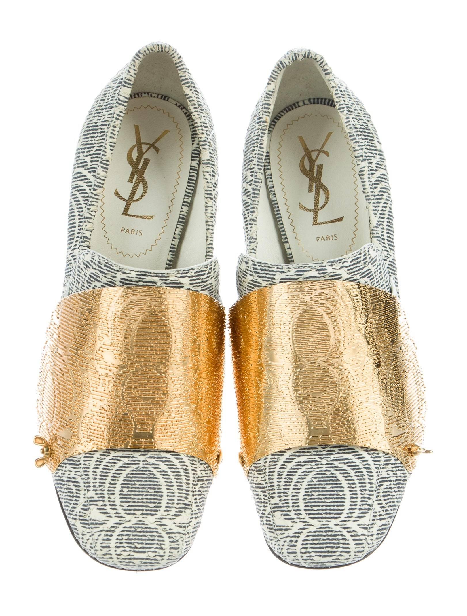 CURATOR'S NOTES

LAST PAIR!  YSL New & SOLD OUT Blue Ivory Gold Plated Block Evening Heels Pumps  

Size IT 36
Leather
Gold tone hardware
Slip on
Made in Italy
Heel height 4" 